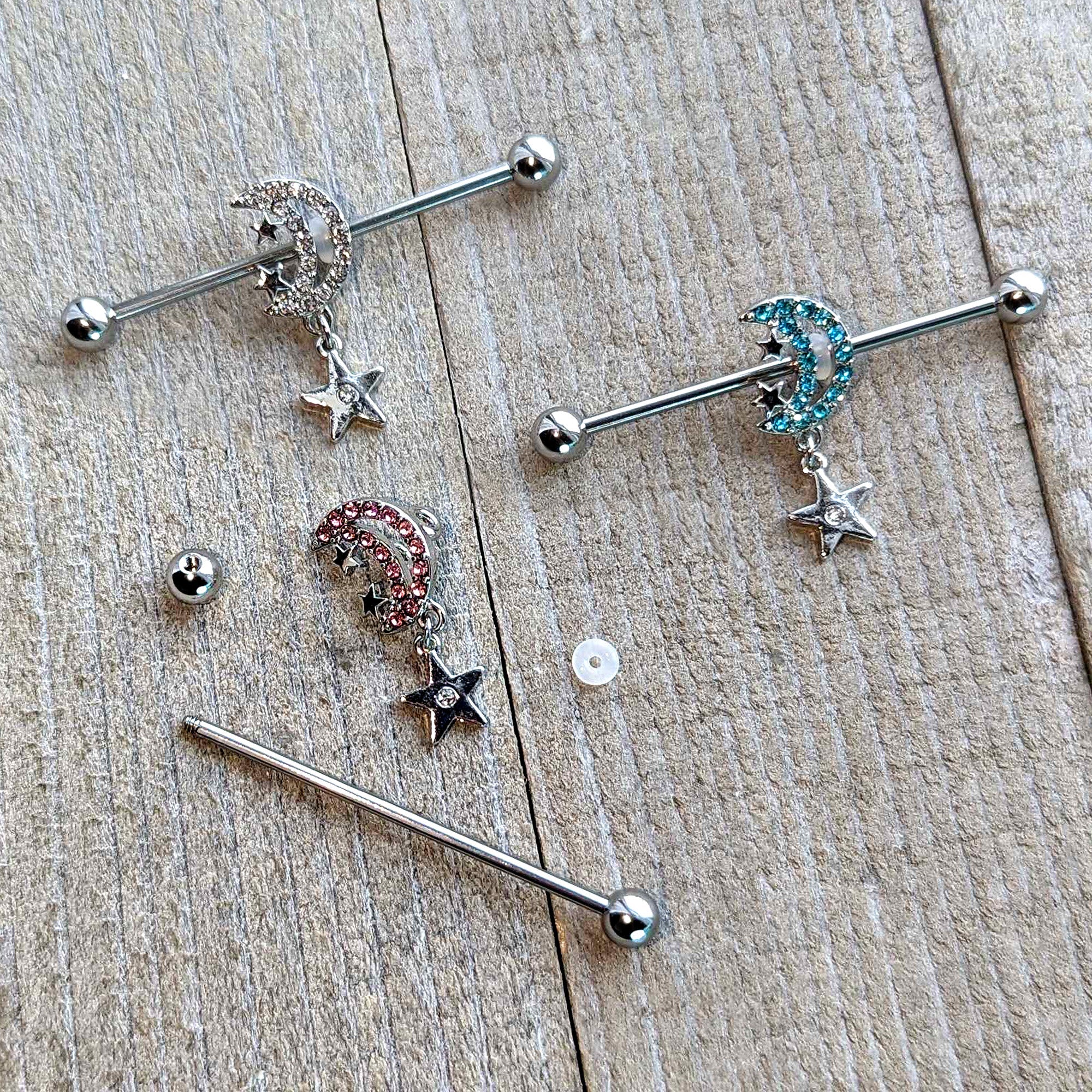 BodyCandy 14G Blue CZ Gem Moon Dangle Star Industrial Barbell 38mm — in-use photo