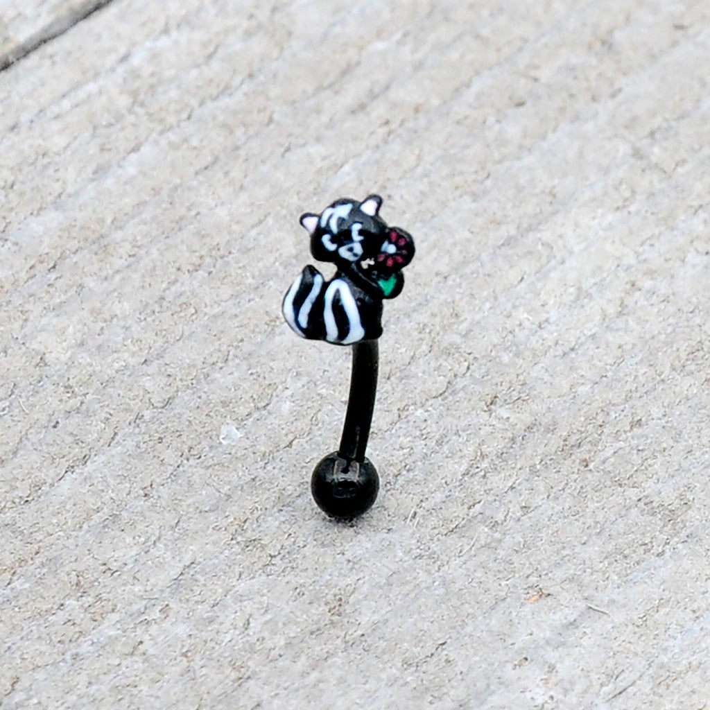 BodyCandy 16G 5/16 Black Funky Skunk Curved Eyebrow Ring — lifestyle context