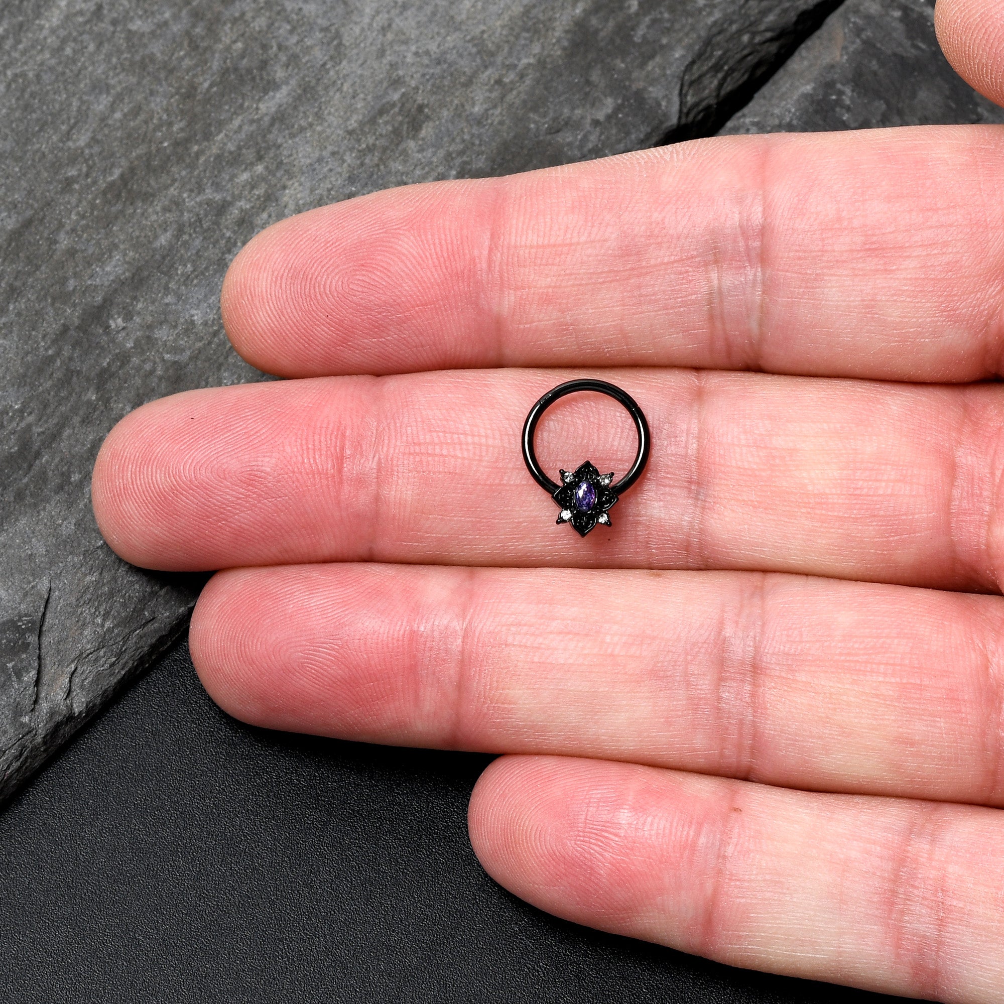 BodyCandy 16G 3/8 Purple Gem Black Scrolling Hearts Hinged Segment Ring — lifestyle context