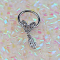 BodyCandy 16G 3/8 Clear Gem Dollar Sign Dangle Hinged Segment Ring — main product shot