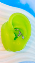BodyCandy 16G 5/16 Clear Gem Dollar Sign Dangle Hinged Segment Ring — main product shot