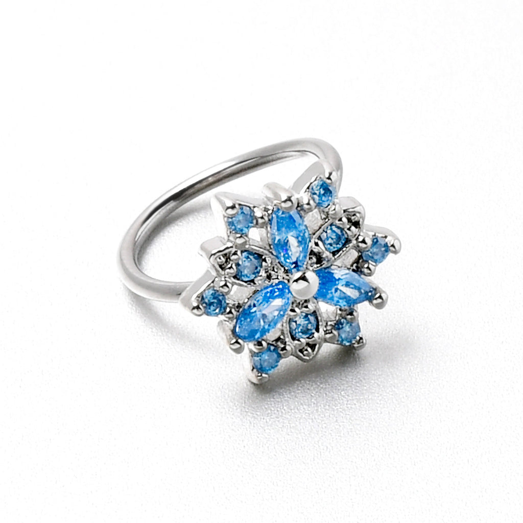 BodyCandy 20G 5/16 Blue CZ Gem Snowflake Style Nose Hoop — in-use photo