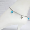 BodyCandy Blue Gem Cross Dangle Stainless Steel Ankle Bracelet — main product shot