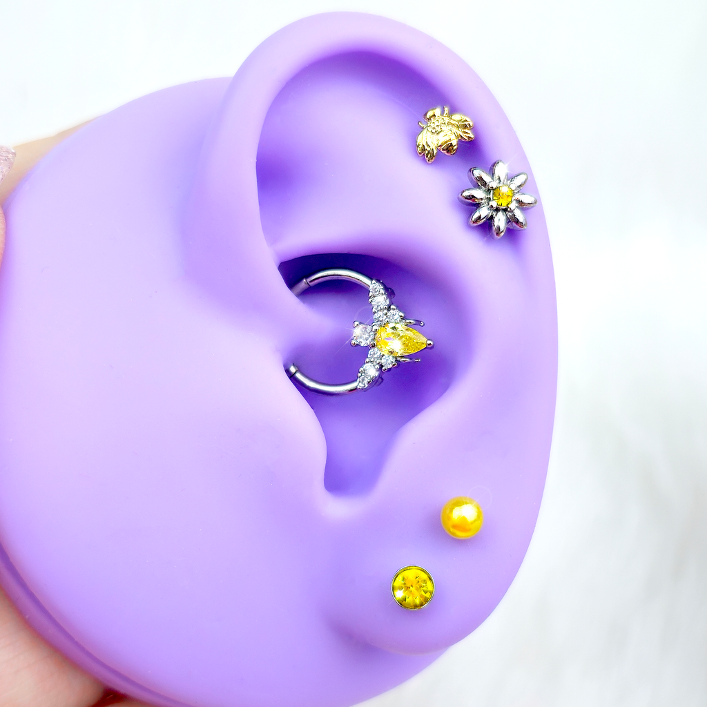 BodyCandy 16G Yellow Gem Bee Flower Labret Segment Ring Ear Curation Set of 5 — detail close-up