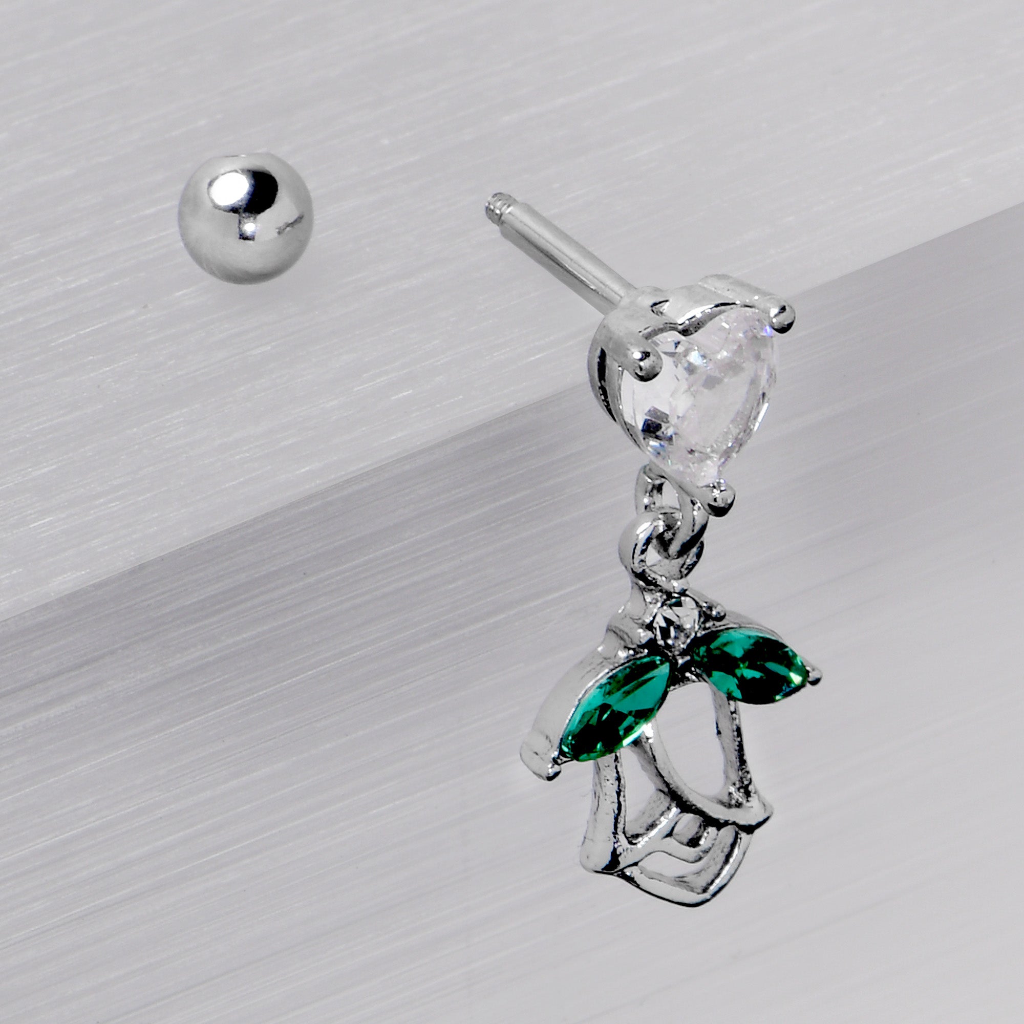 BodyCandy 16G 1/4 Clear CZ Gem Heart And Rose Dangle Cartilage Earring — in-use photo