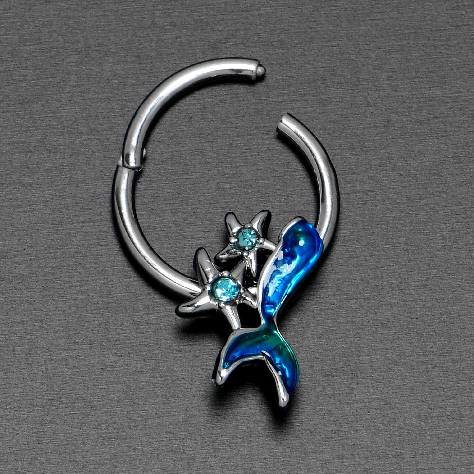 BodyCandy 16G 3/8 Blue Gem Blue Mermaid Tail Stars Hinged Segment Ring — in-use photo
