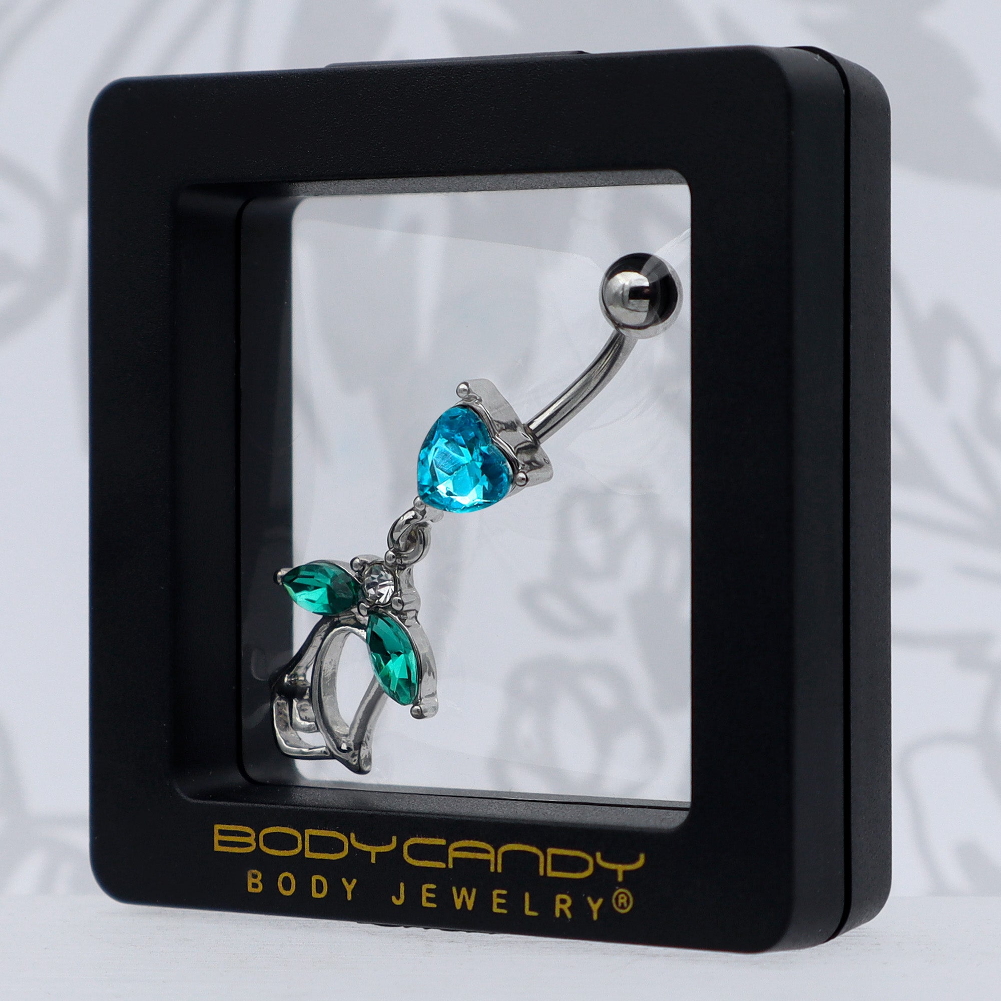 BodyCandy Blue CZ Gem Heart And Rose Dangle Belly Ring — in-use photo