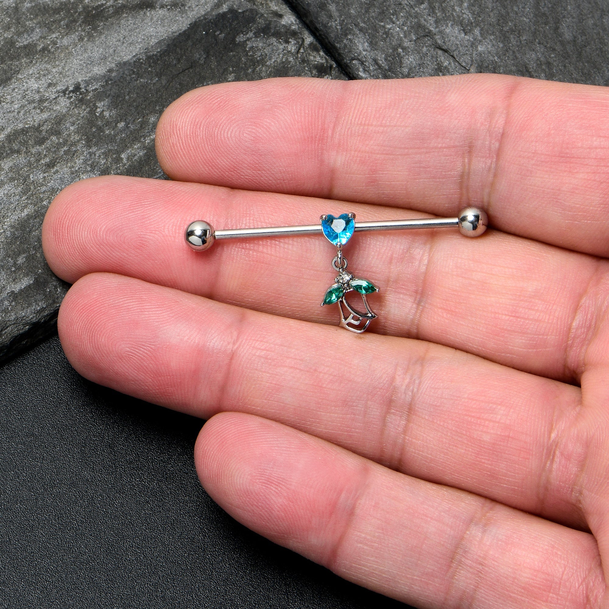 BodyCandy 14G Blue CZ Gem Heart And Rose Dangle Industrial Barbell 38mm — lifestyle context