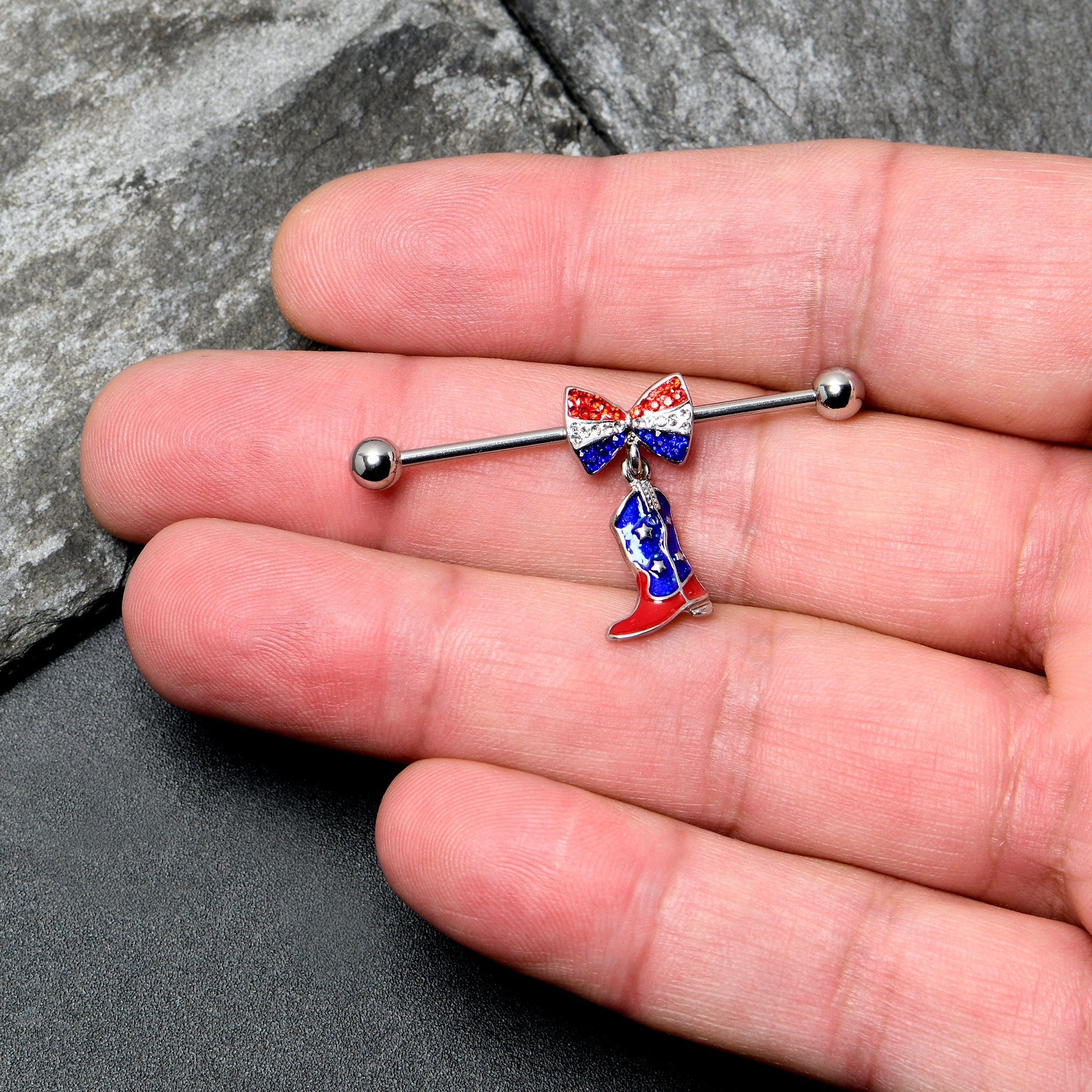 BodyCandy 14G Red Blue Gem Bow Cowboy Boot Patriotic Industrial Barbell 38mm — lifestyle context