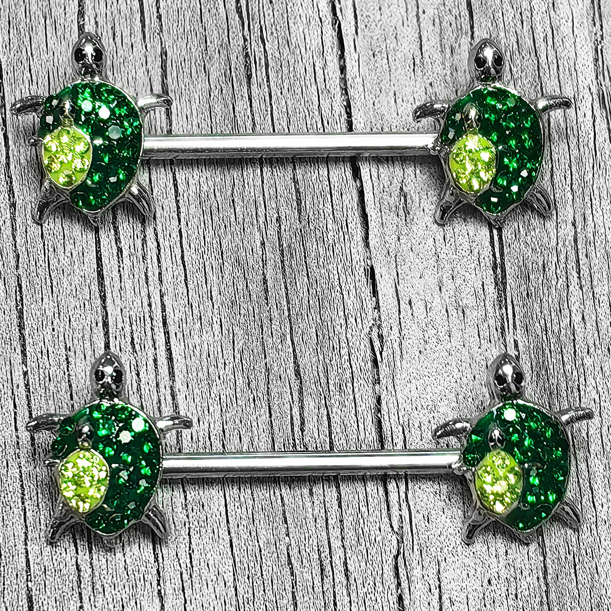 BodyCandy 14G 9/16 Green Gem Turtle World Barbell Nipple Ring Set — detail close-up