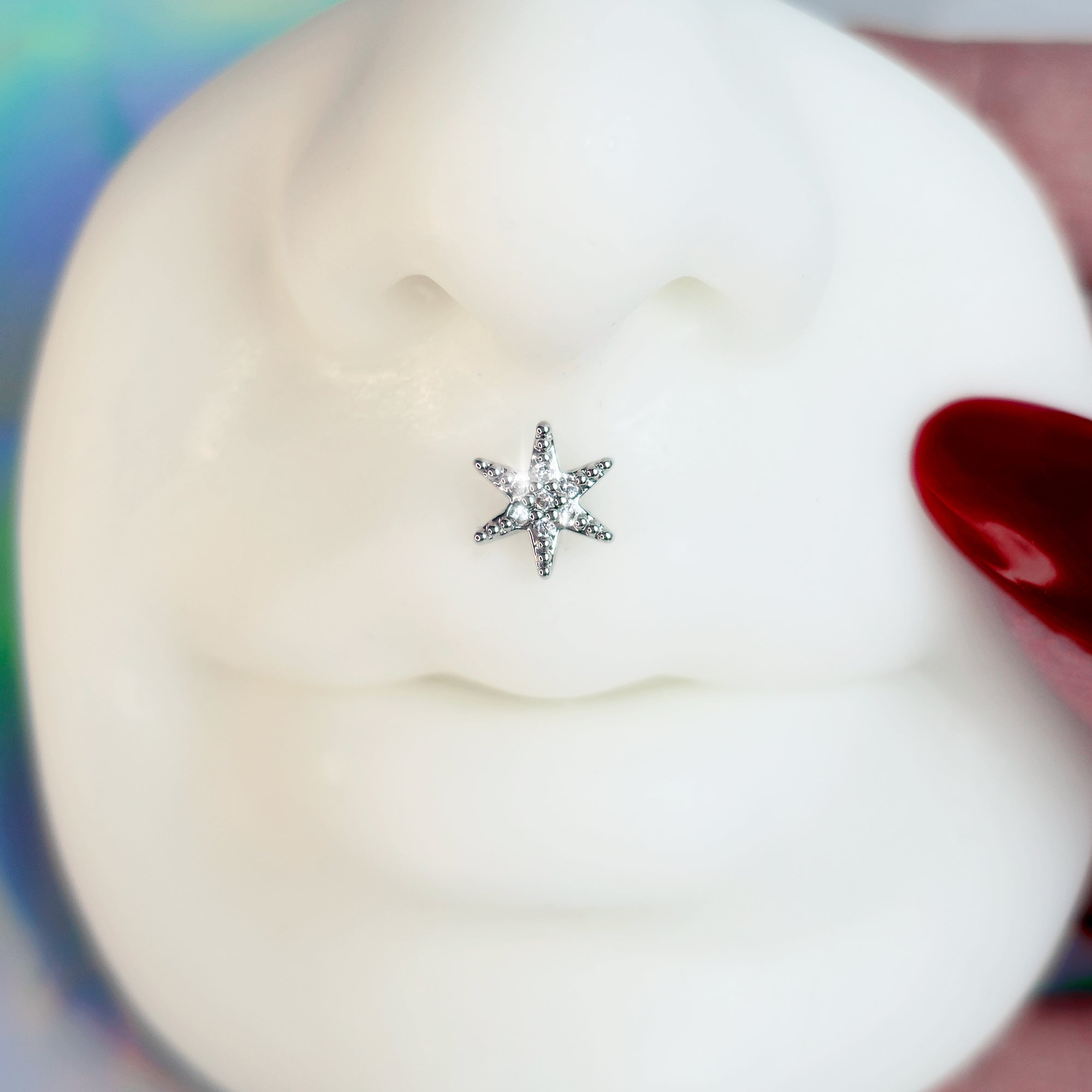 BodyCandy 16G 5/16 Clear CZ Gem Lavish Star Internally Threaded Labret Tragus — detail close-up