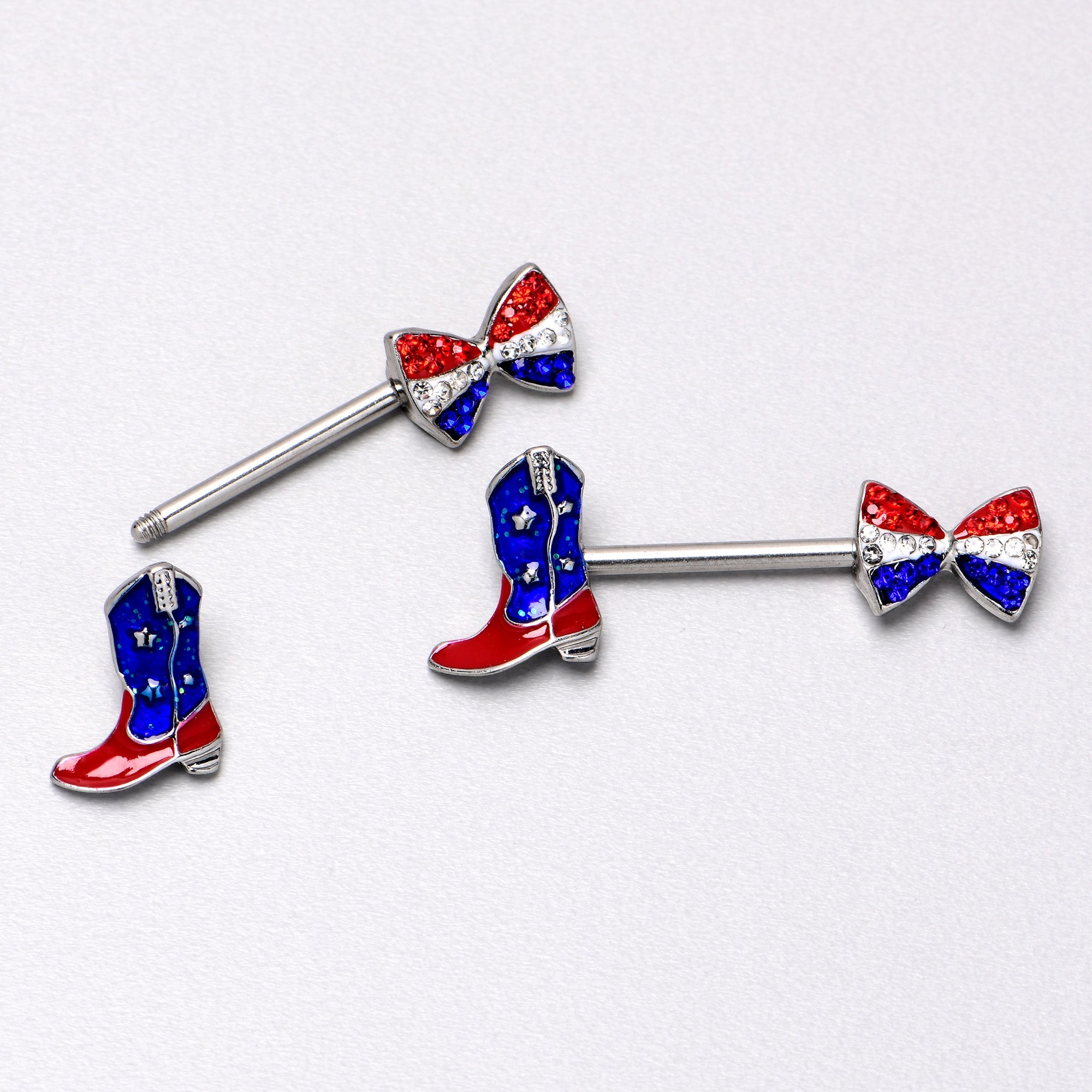 BodyCandy 14G 9/16 Red Blue Gem Bow Cowboy Boot Patriotic Nipple Ring Set — in-use photo