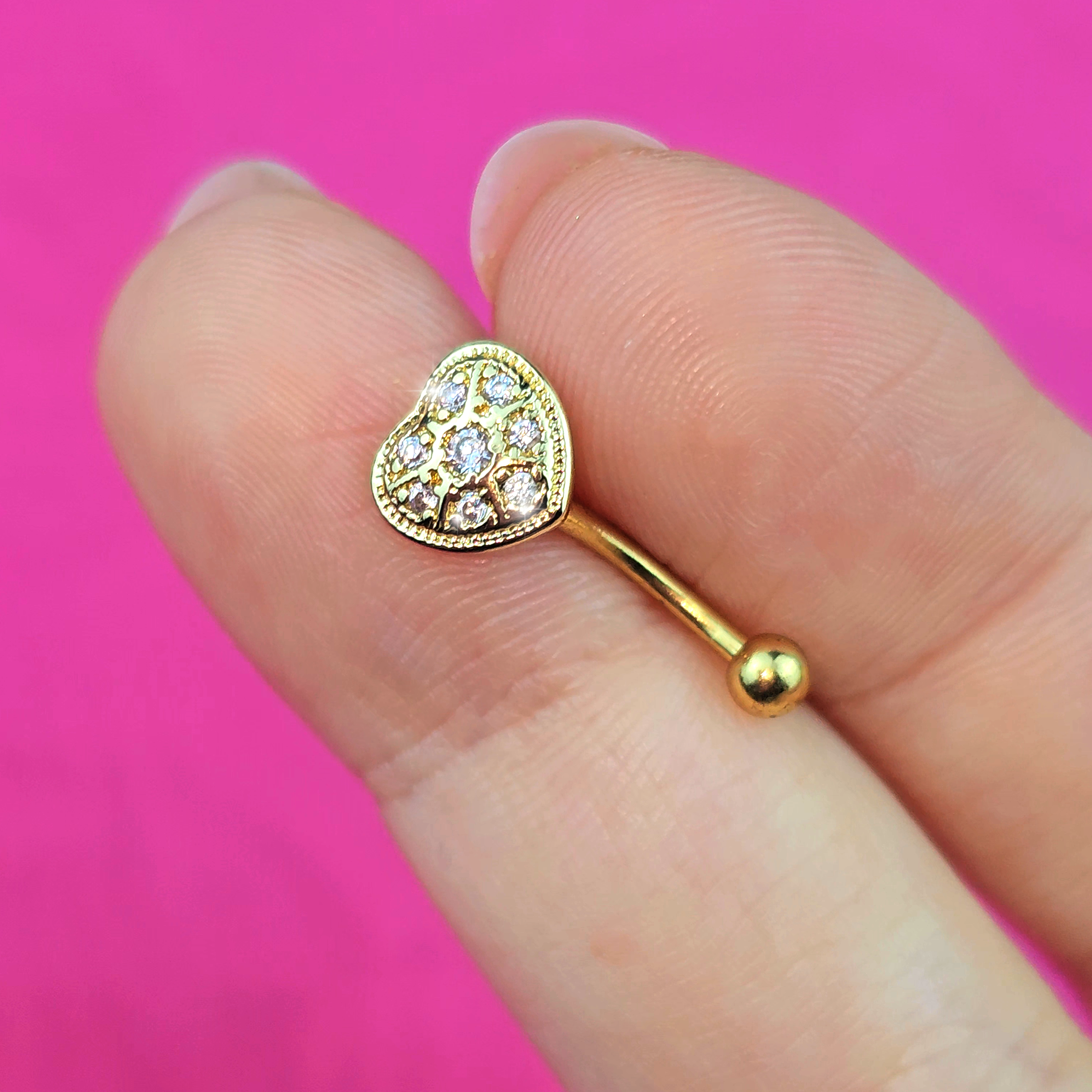 BodyCandy 16G 5/16 Clear Gem Gold Tone Ultra Luxe Heart Curved Eyebrow Ring — lifestyle context