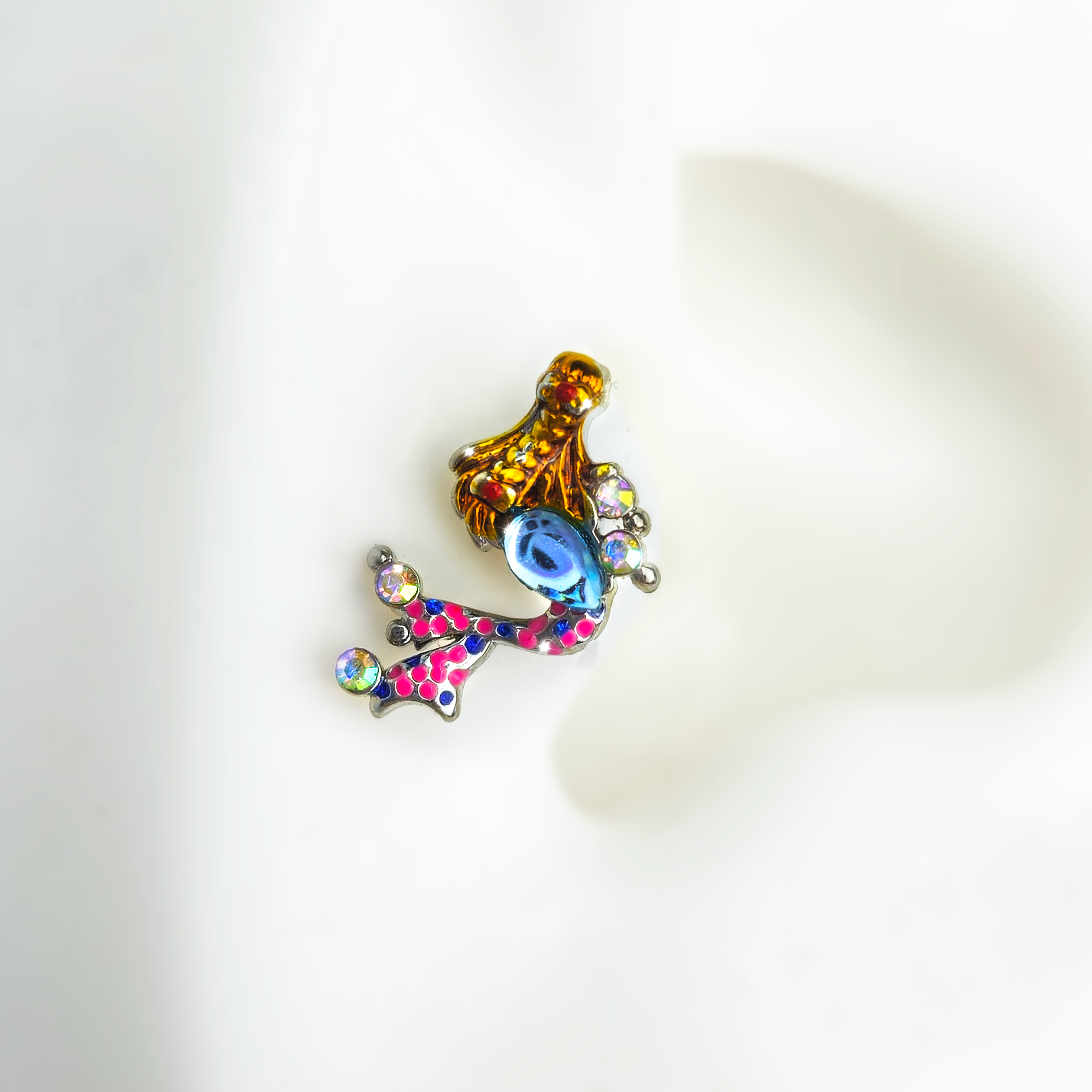 BodyCandy 16G 1/4 Aurora Gem Abstract Mermaid Labret — detail close-up