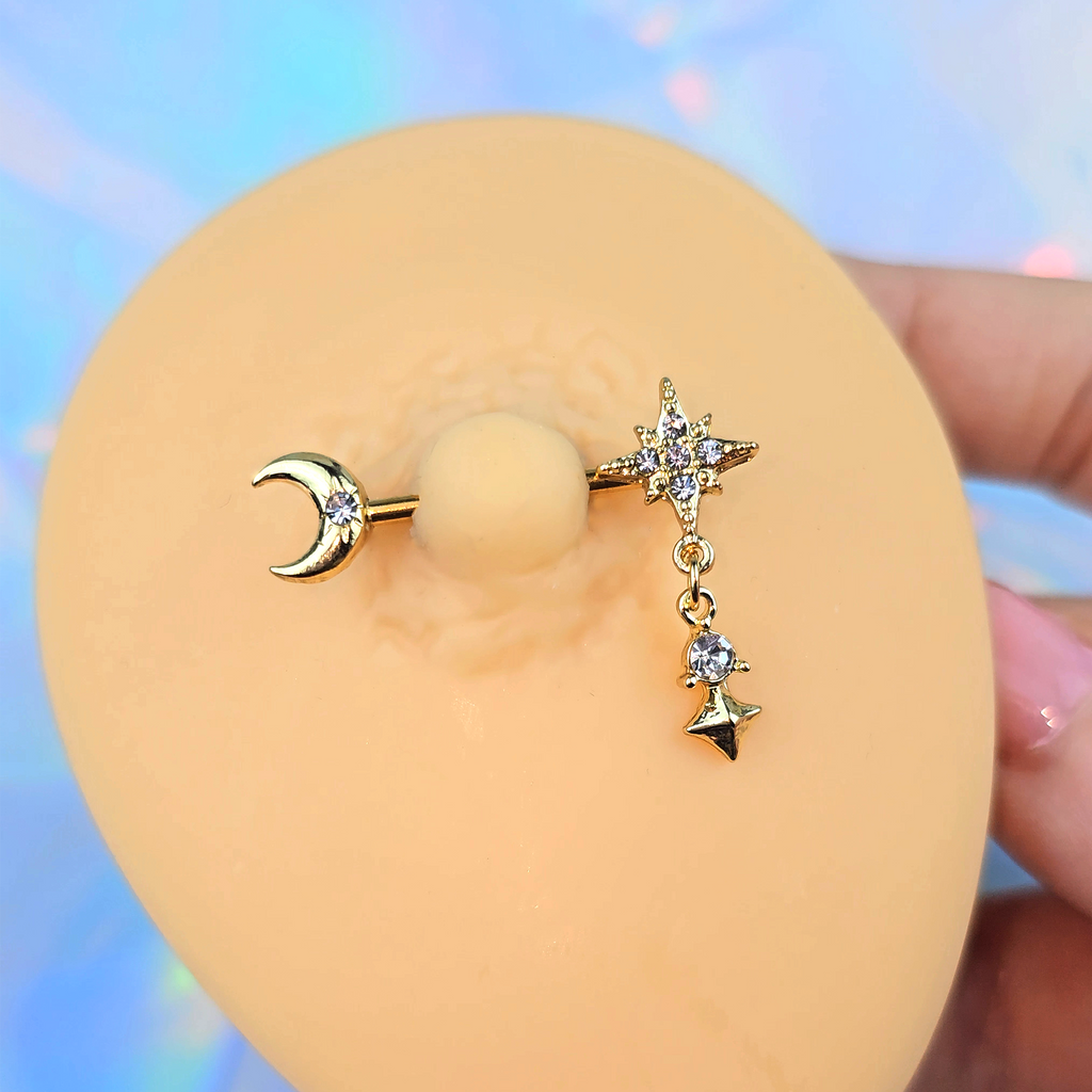 BodyCandy 14G 9/16 Clear Gem Gold Tone Celestial Glam Dangle Nipple Ring Set — detail close-up