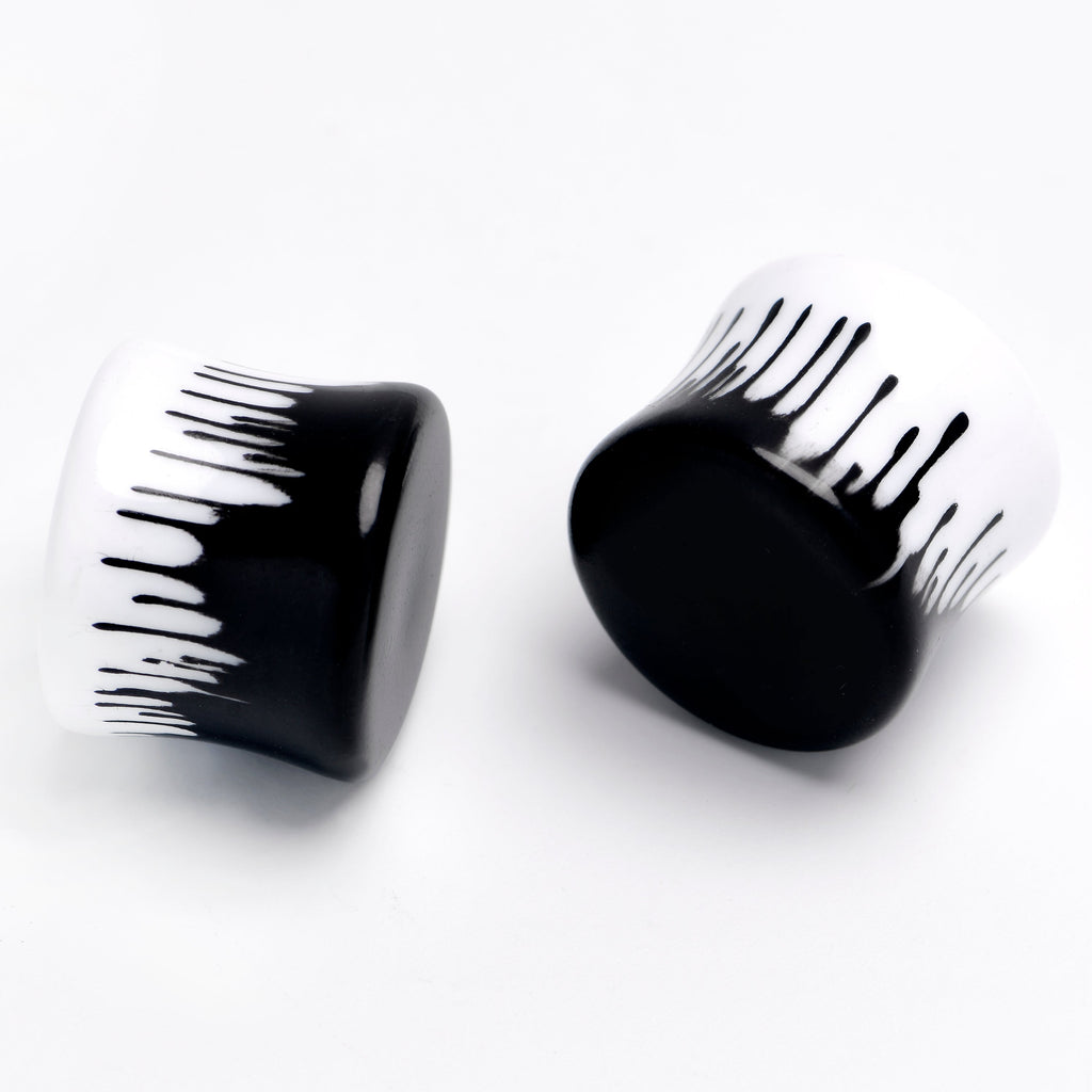BodyCandy White Black Drip Acrylic Double Flare Plugs — in-use photo
