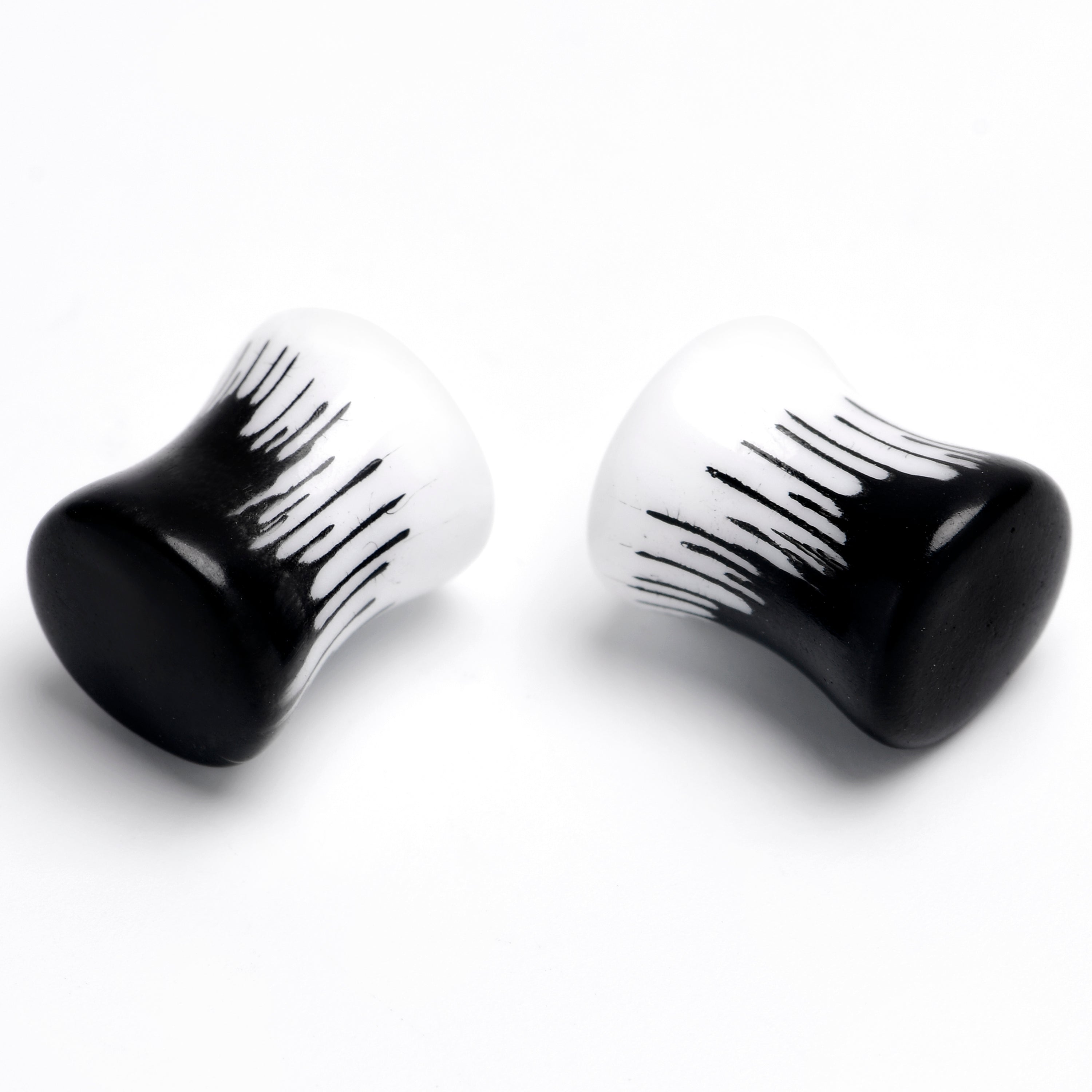 BodyCandy White Black Drip Acrylic Double Flare Plugs — lifestyle context