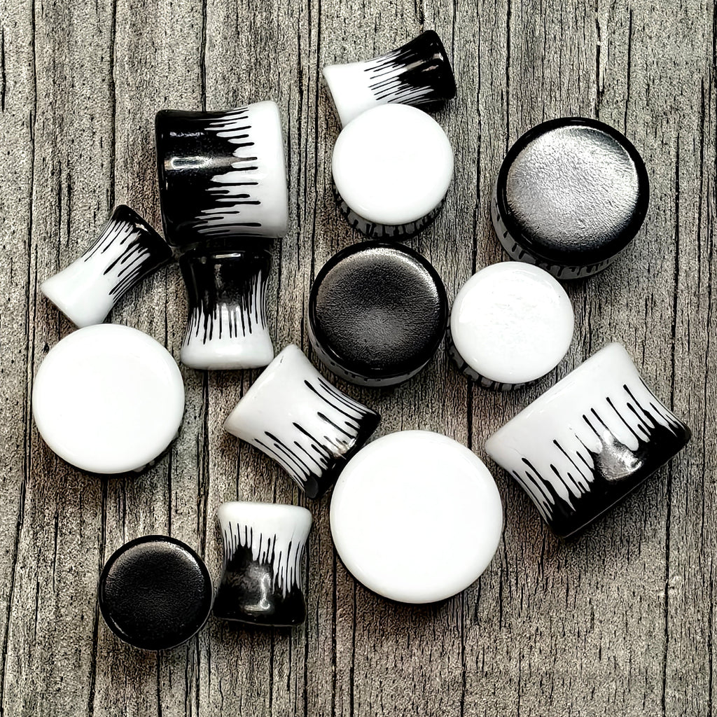 BodyCandy White Black Drip Acrylic Double Flare Plugs — main product shot