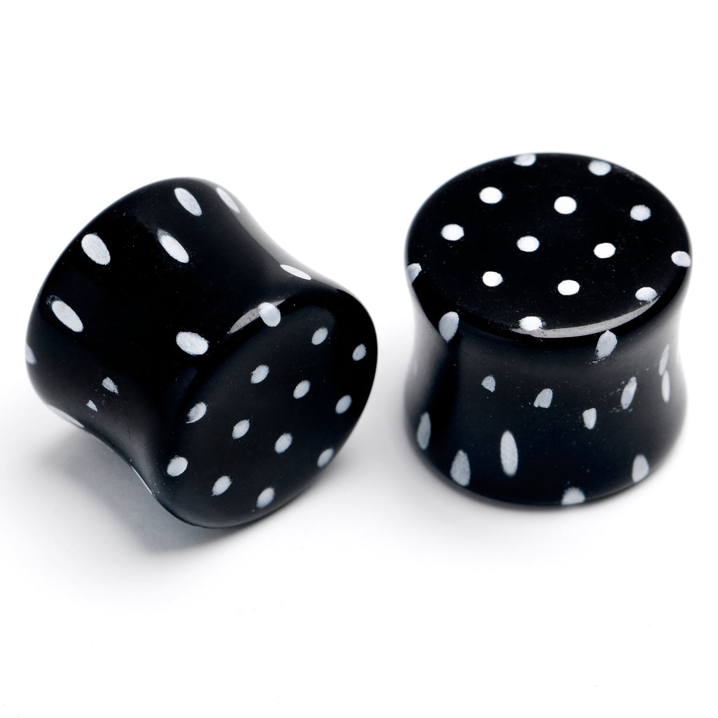 BodyCandy Black Acrylic Polka Dots White Double Flare Plug Set — in-use photo