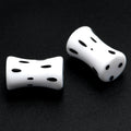 BodyCandy White Acrylic Retro Dots Black Double Flare Plug Set  6mm to 20mm Sizes — detail close-up