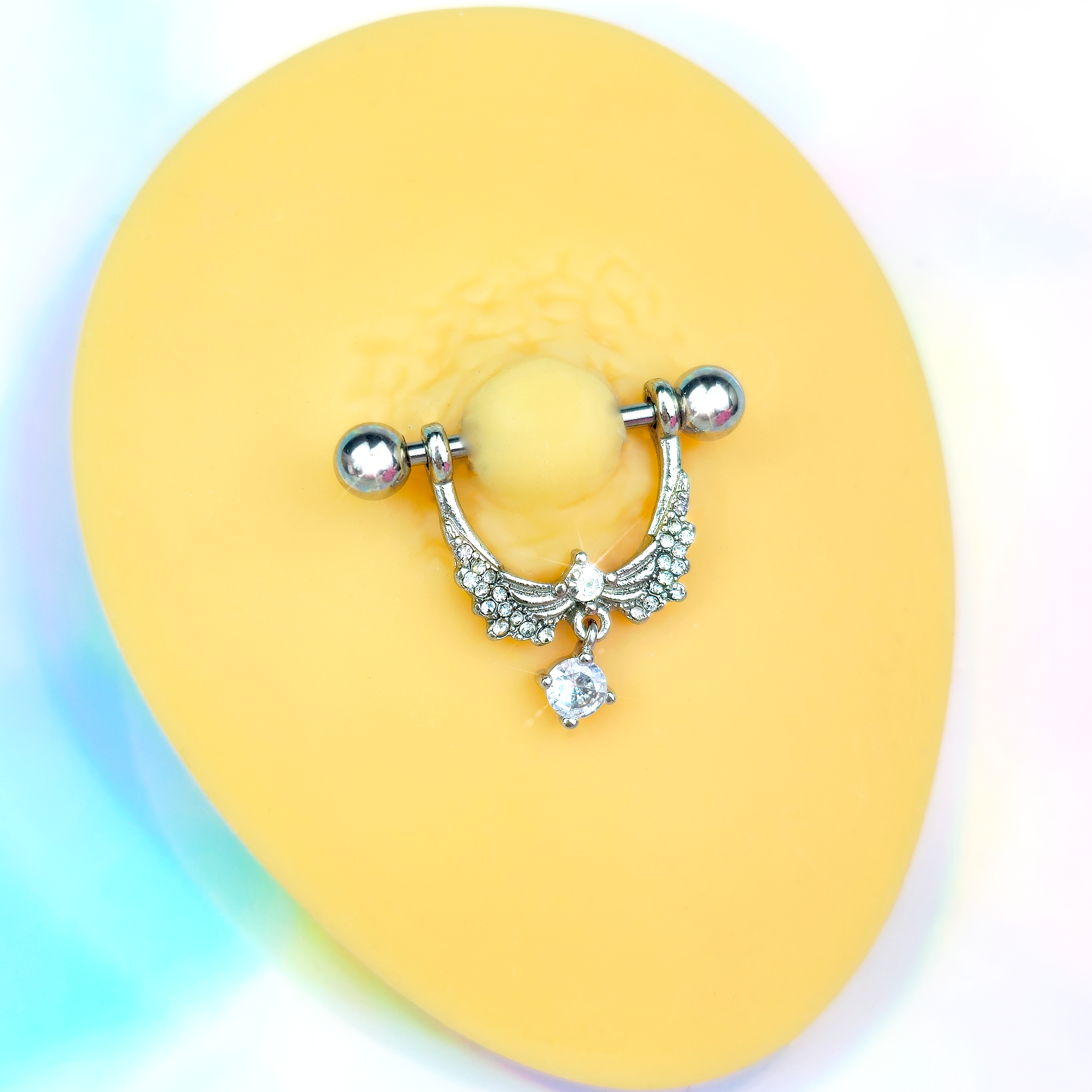 BodyCandy 14G 9/16 Clear CZ Gem Alluring Wings Dangle Nipple Ring Set — detail close-up