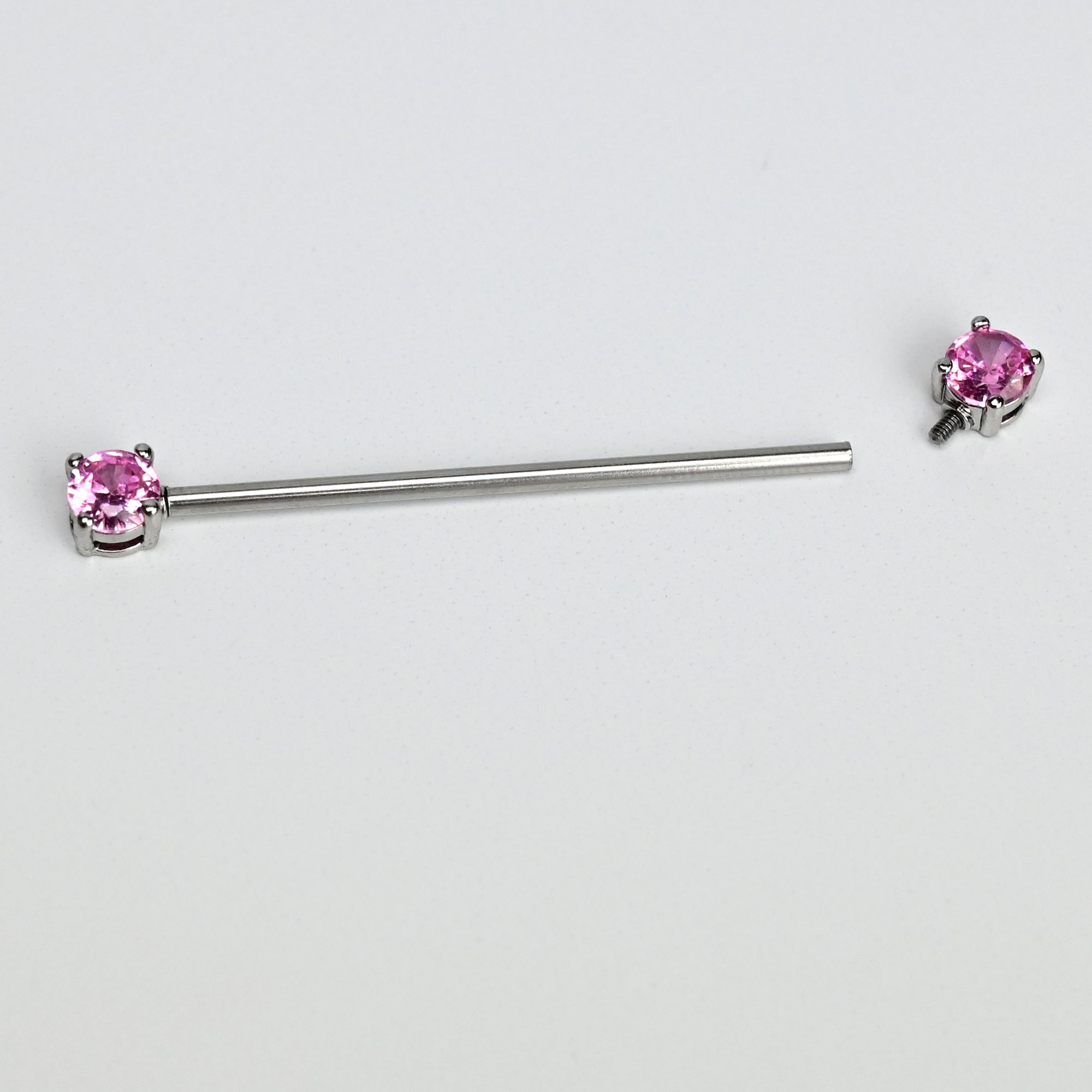 BodyCandy 14G Pink Gem Forward Facing Internally Threaded Industrial Barbell 38mm — detail close-up