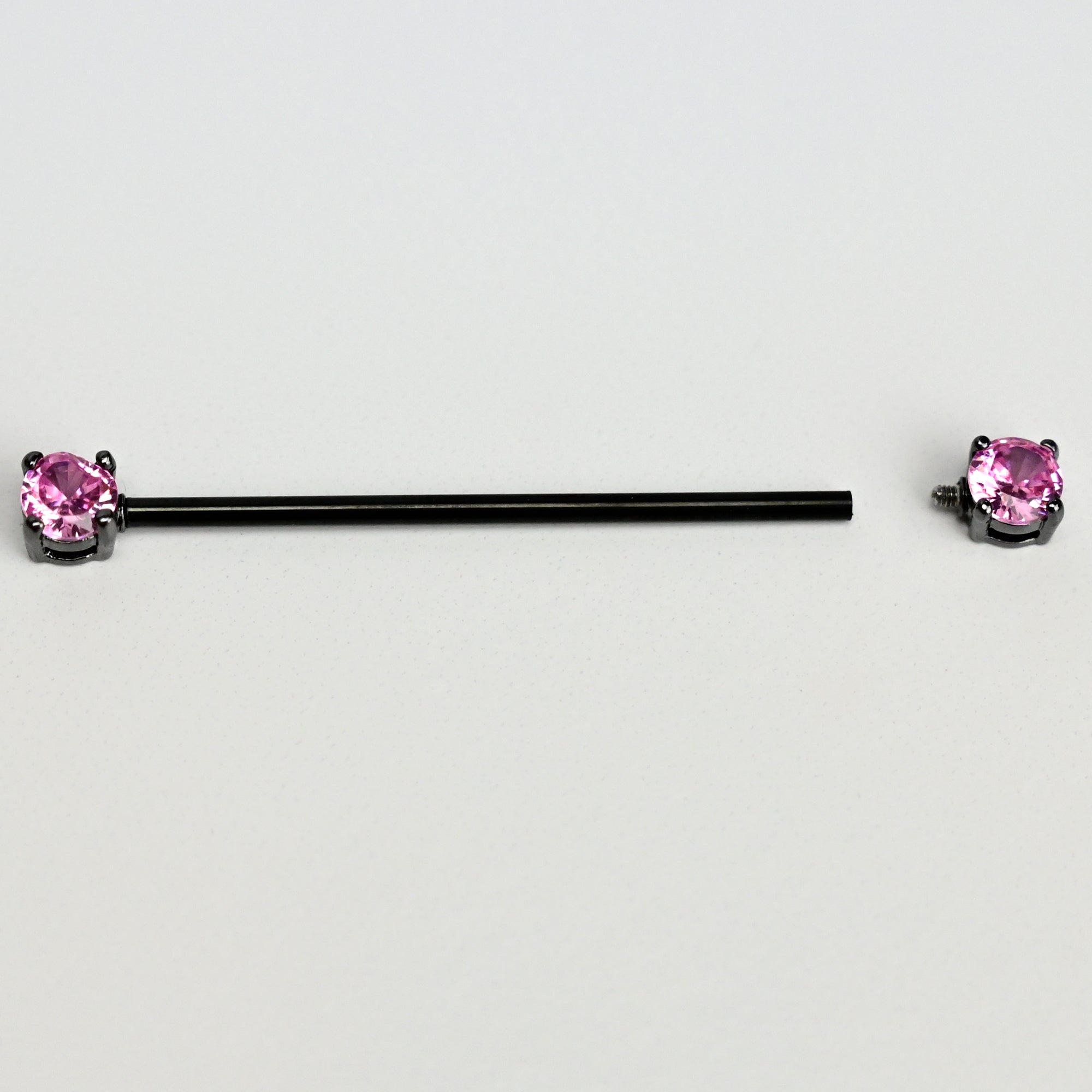 BodyCandy 14G Pink Gem Black Forward Facing Internally Threaded Industrial Barbell 38mm — detail close-up