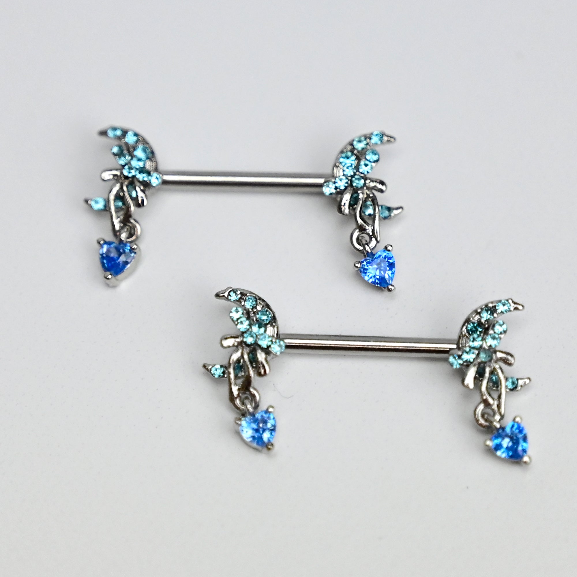 BodyCandy 14G 9/16 Blue Gem Moon Bow Heart Dangle Nipple Ring Set — main product shot