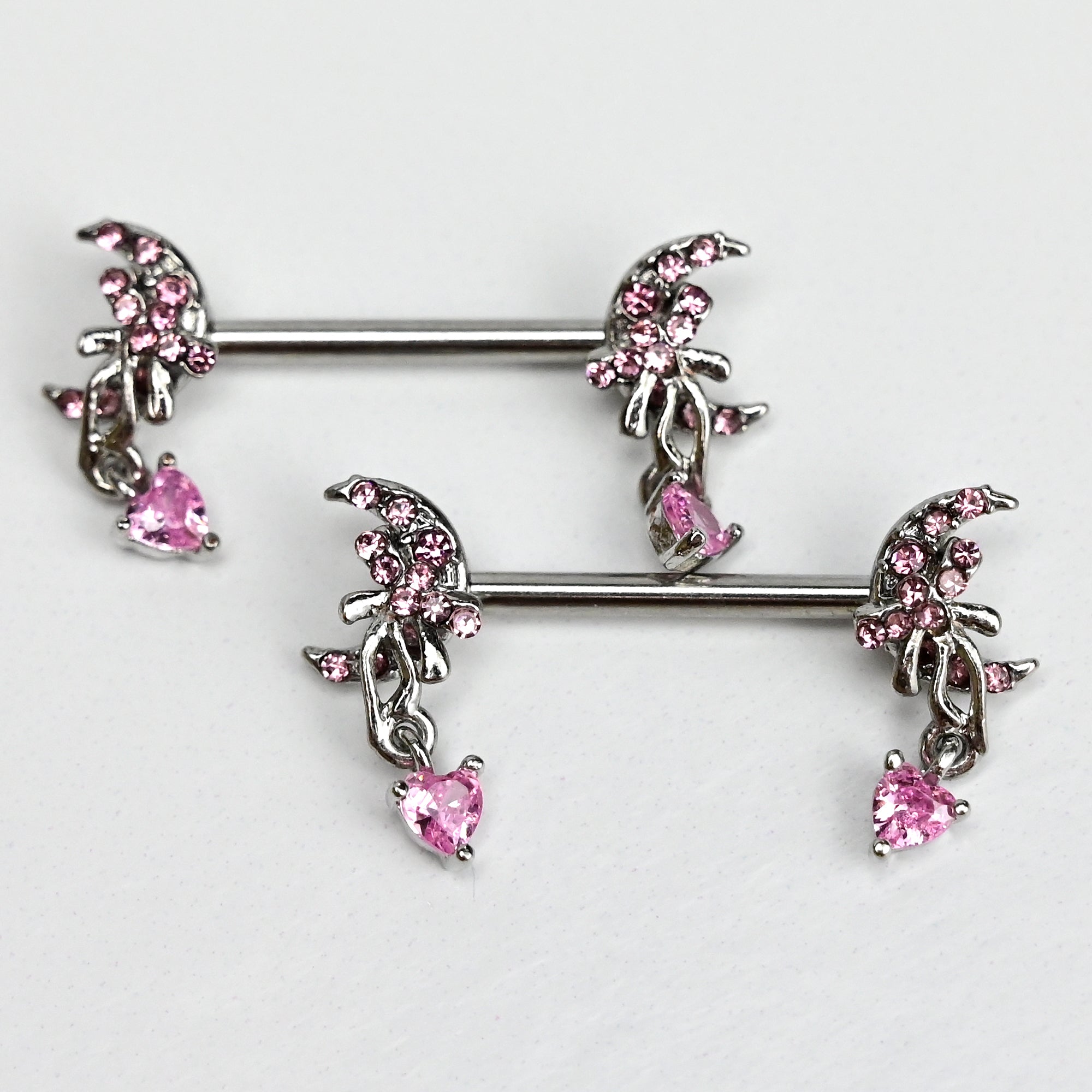 BodyCandy 14G 9/16 Pink Gem Moon Bow Heart Dangle Nipple Ring Set — detail close-up