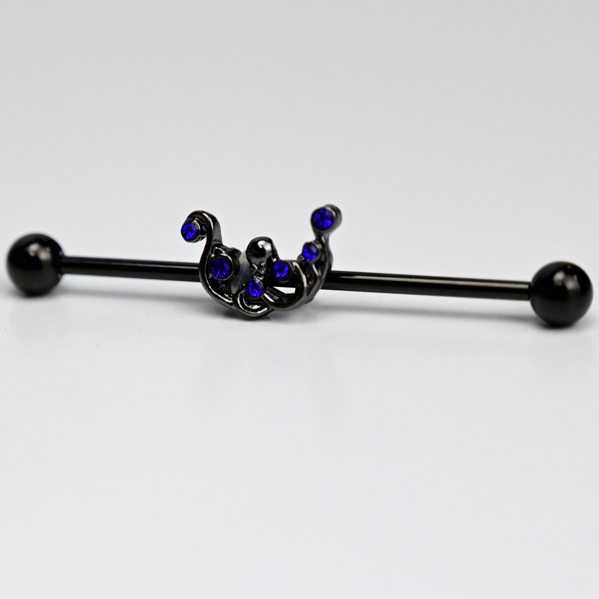BodyCandy 14G Blue Gem Black Scrolling Elegance Industrial Barbell 38mm — detail close-up