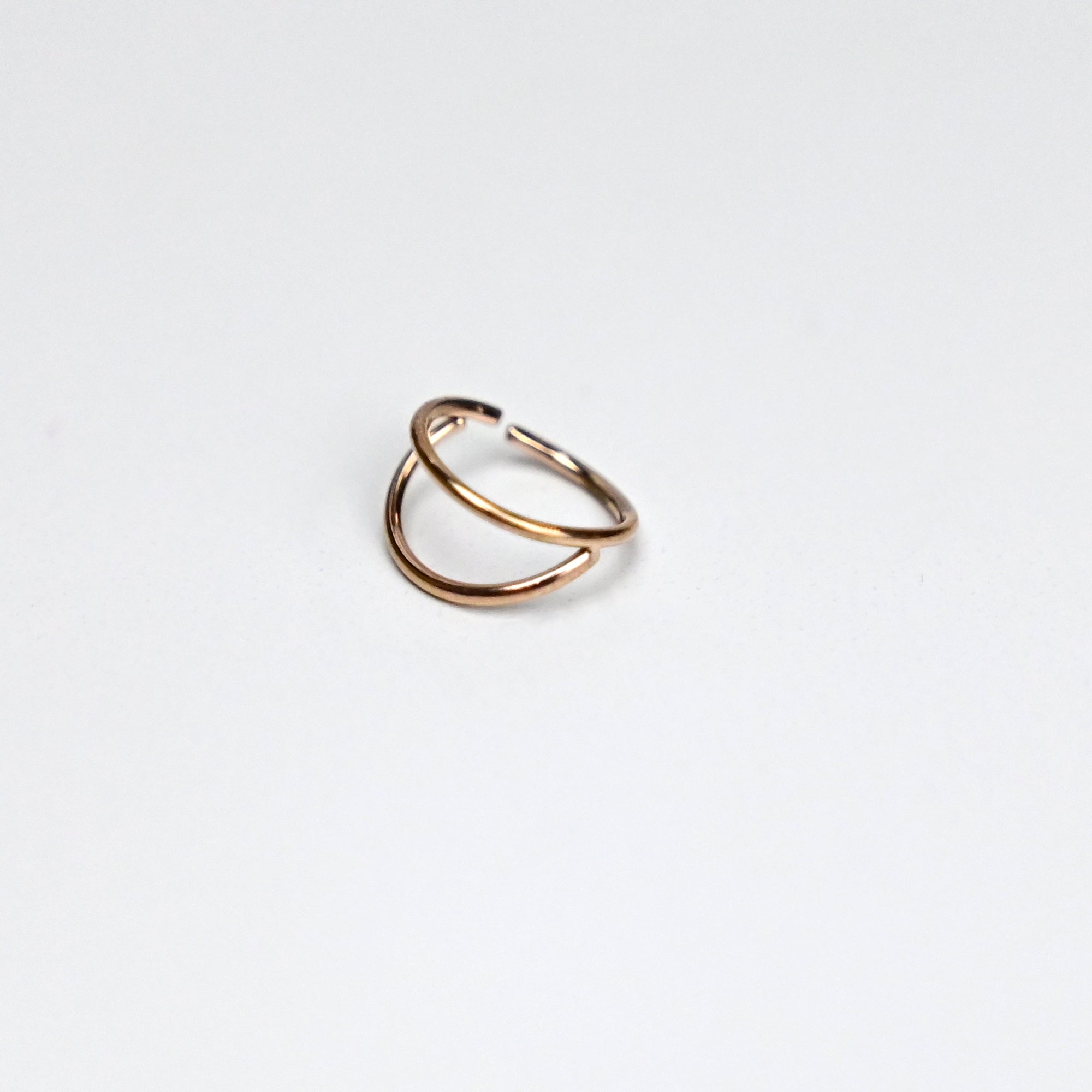 BodyCandy 20G 5/16 Rose Gold Tone Double Nose Hoop — detail close-up