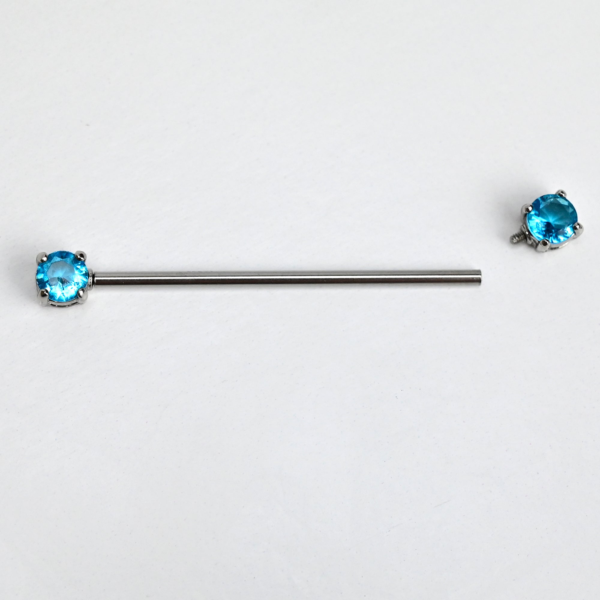 BodyCandy 14G Blue CZ Gem Internally Threaded Industrial Barbell 38mm — lifestyle context
