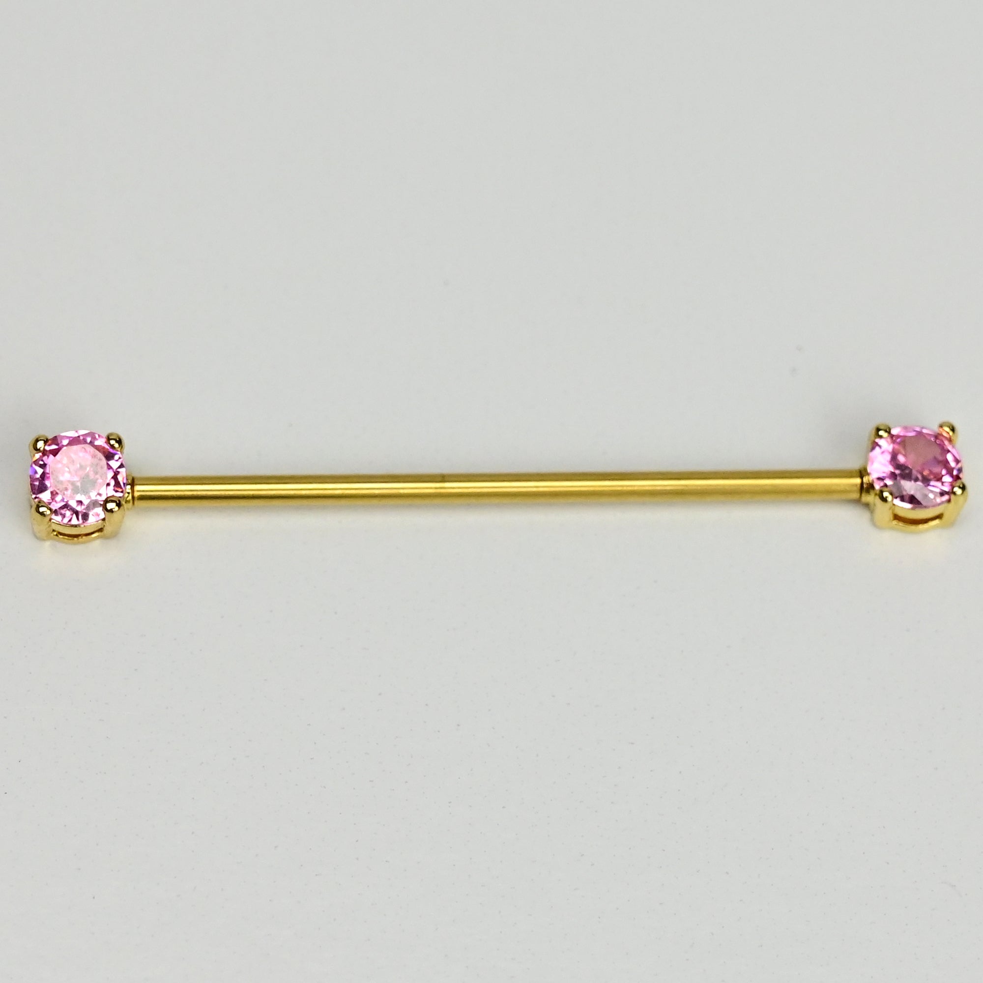 BodyCandy 14G Pink Gem Gold Tone Internally Threaded Industrial Barbell 38mm — lifestyle context