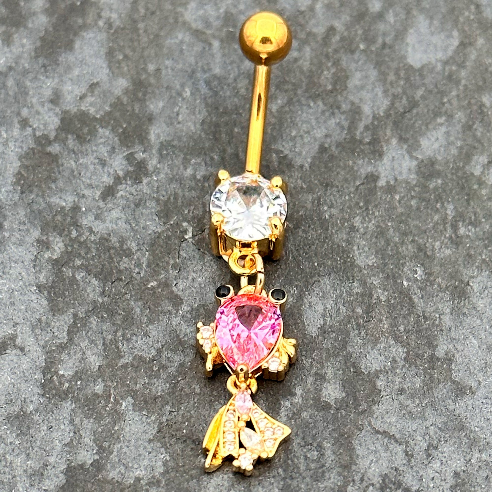 BodyCandy Clear Pink CZ Gem Gold Tone Fanciful Fish Dangle Belly  Ring — lifestyle context