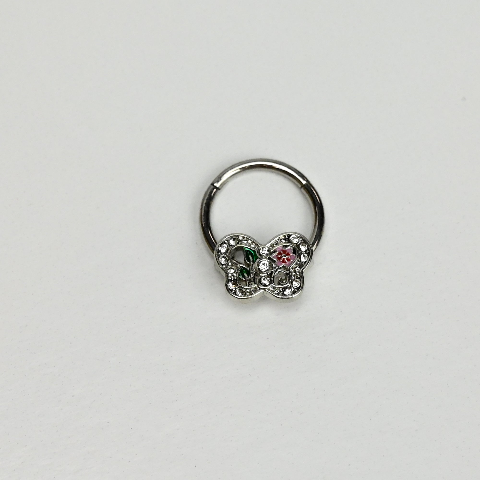 BodyCandy 16G 3/8 Clear Pink Gem Floral Butterfly Style Hinged Segment Ring — main product shot