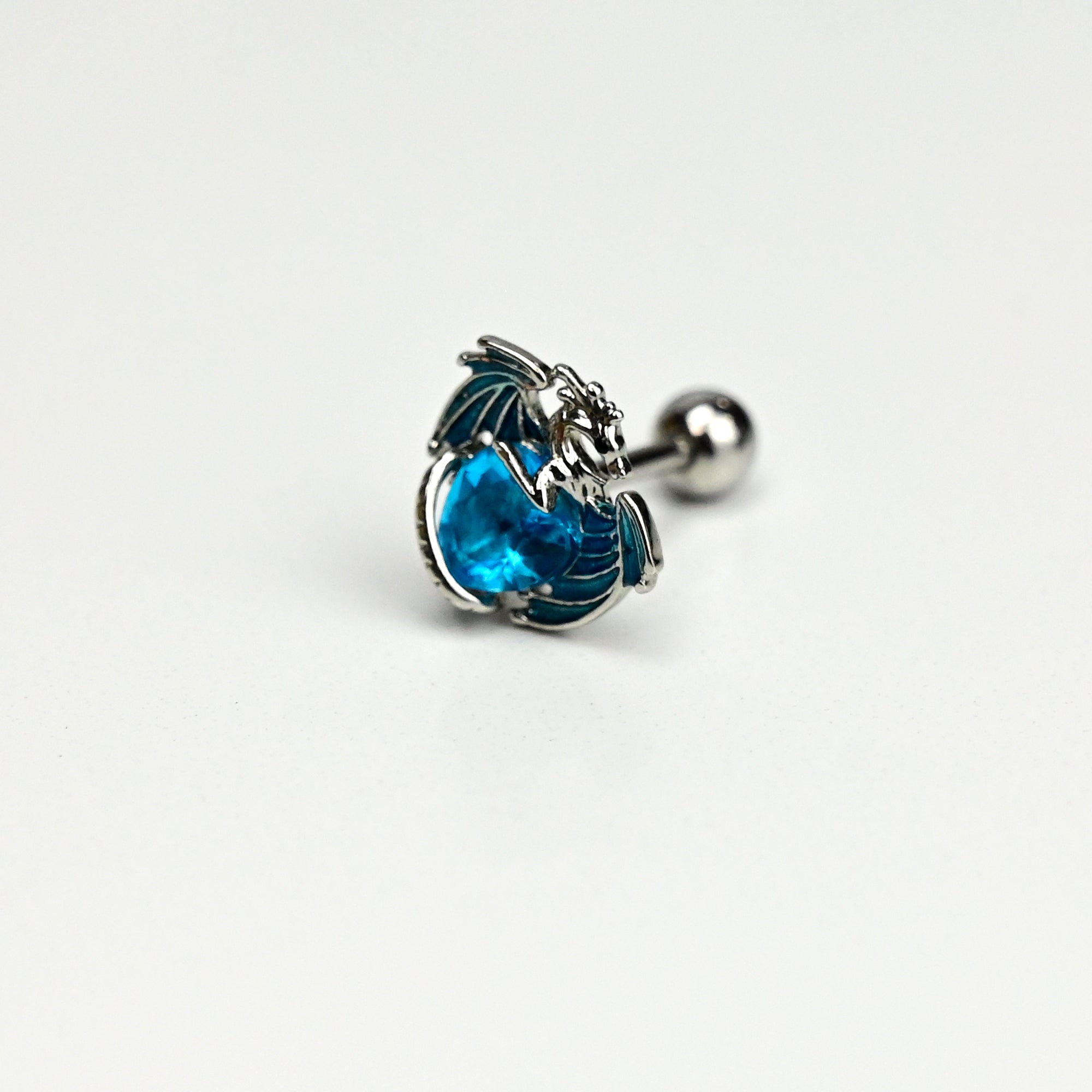 BodyCandy 16G 5/16 Blue CZ Gem Heart Of Dragon Cartilage Tragus Earring — detail close-up