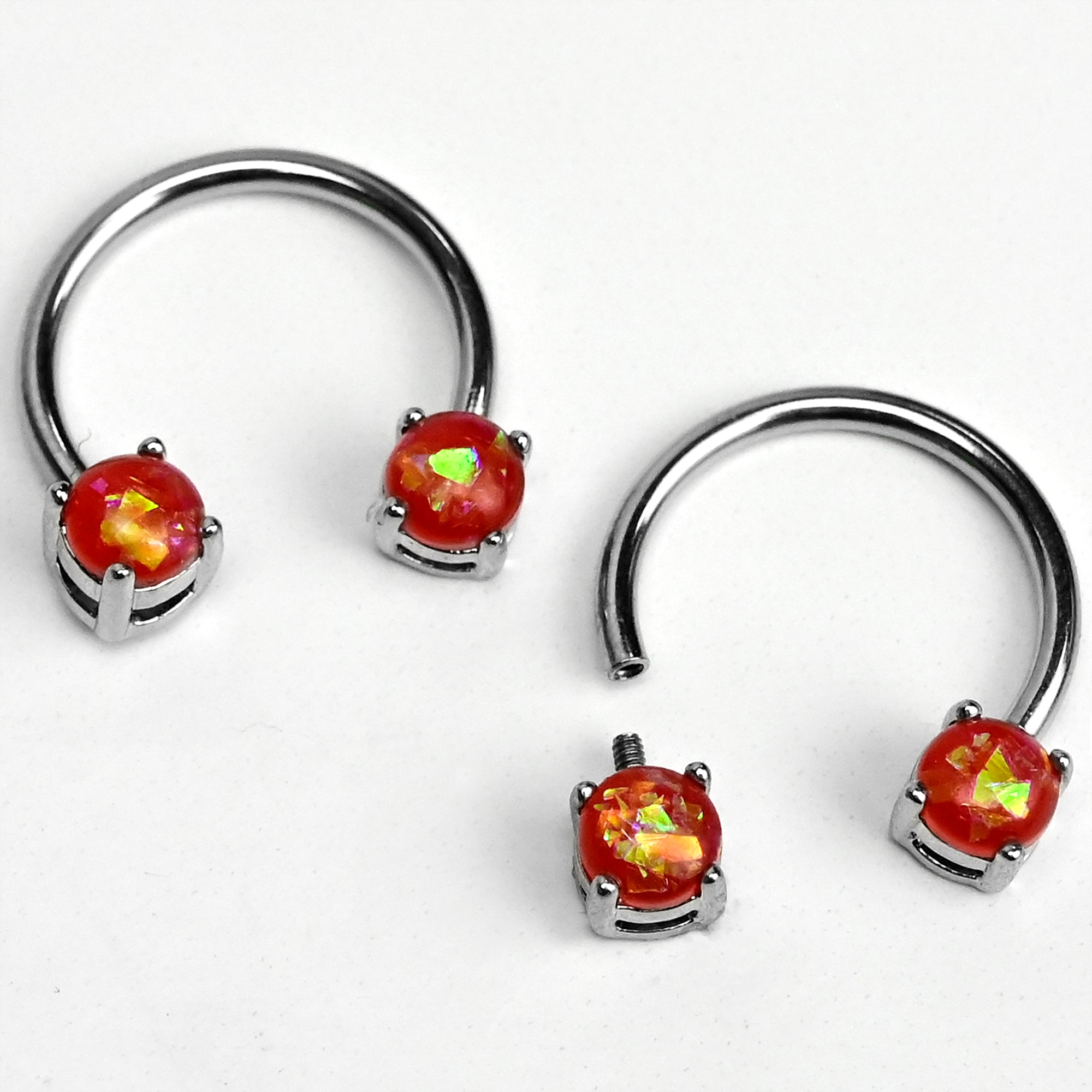 BodyCandy 14G 9/16 Orange Faux Opal Internally Threaded Horseshoe Nipple Ring Set — main product shot