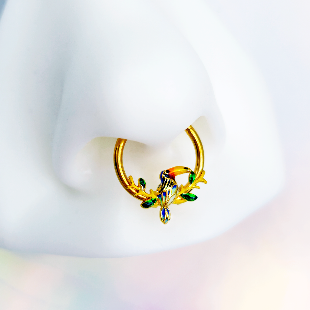 BodyCandy 16G 3/8 Green Gem Gold Tone Tropical Toucan Hinged Segment Ring — detail close-up