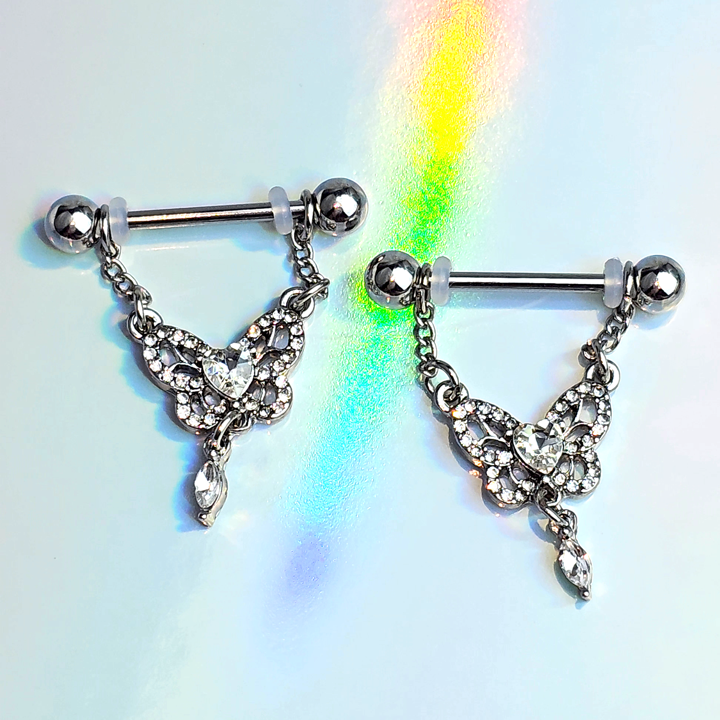 BodyCandy 14G 9/16 Clear Gem Whimsical Butterfly Dangle Nipple Ring Set — detail close-up