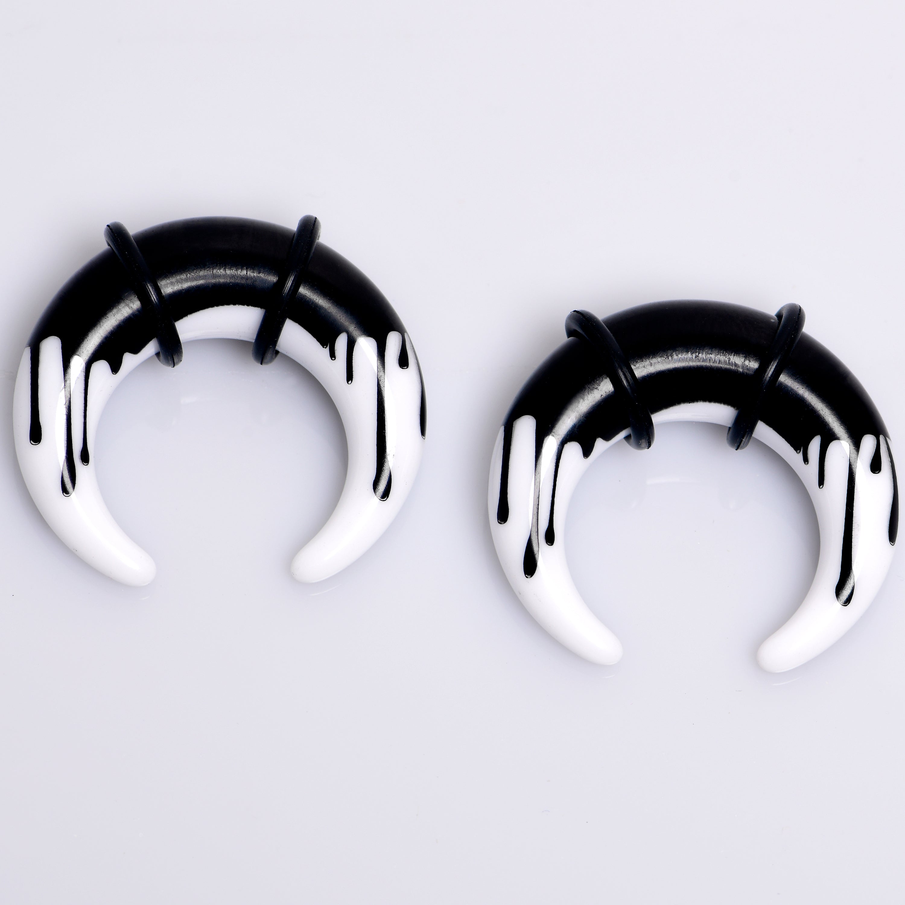 BodyCandy 0G White Black Drip Acrylic Pincher Curved Taper Set — main product shot