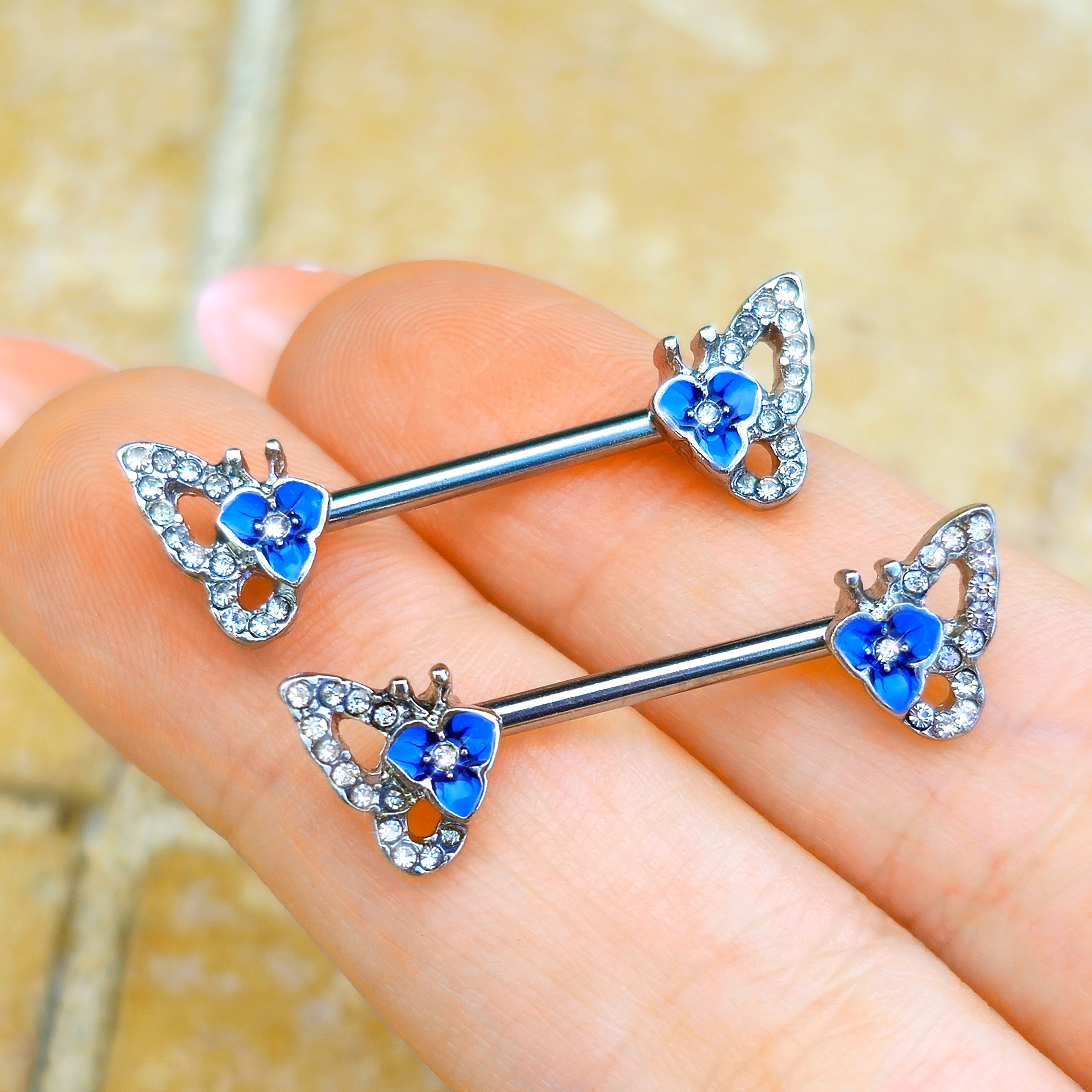 BodyCandy 14G 9/16 Clear Gem Fabulous Butterfly Blue Barbell Nipple Ring Set — detail close-up
