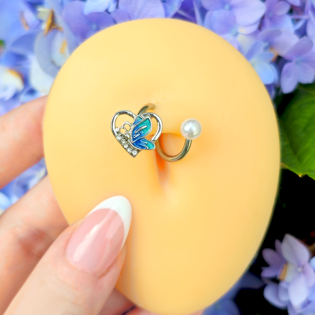 BodyCandy Clear Gem Butterfly Love Heart Blue Spiral Twister Belly Ring — detail close-up