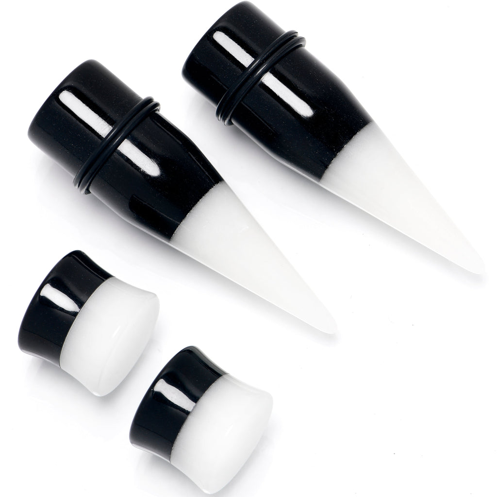 BodyCandy Black White Acrylic Glow in the Dark Taper Saddle Plug Set 8mm to 16mm Sizes — in-use photo