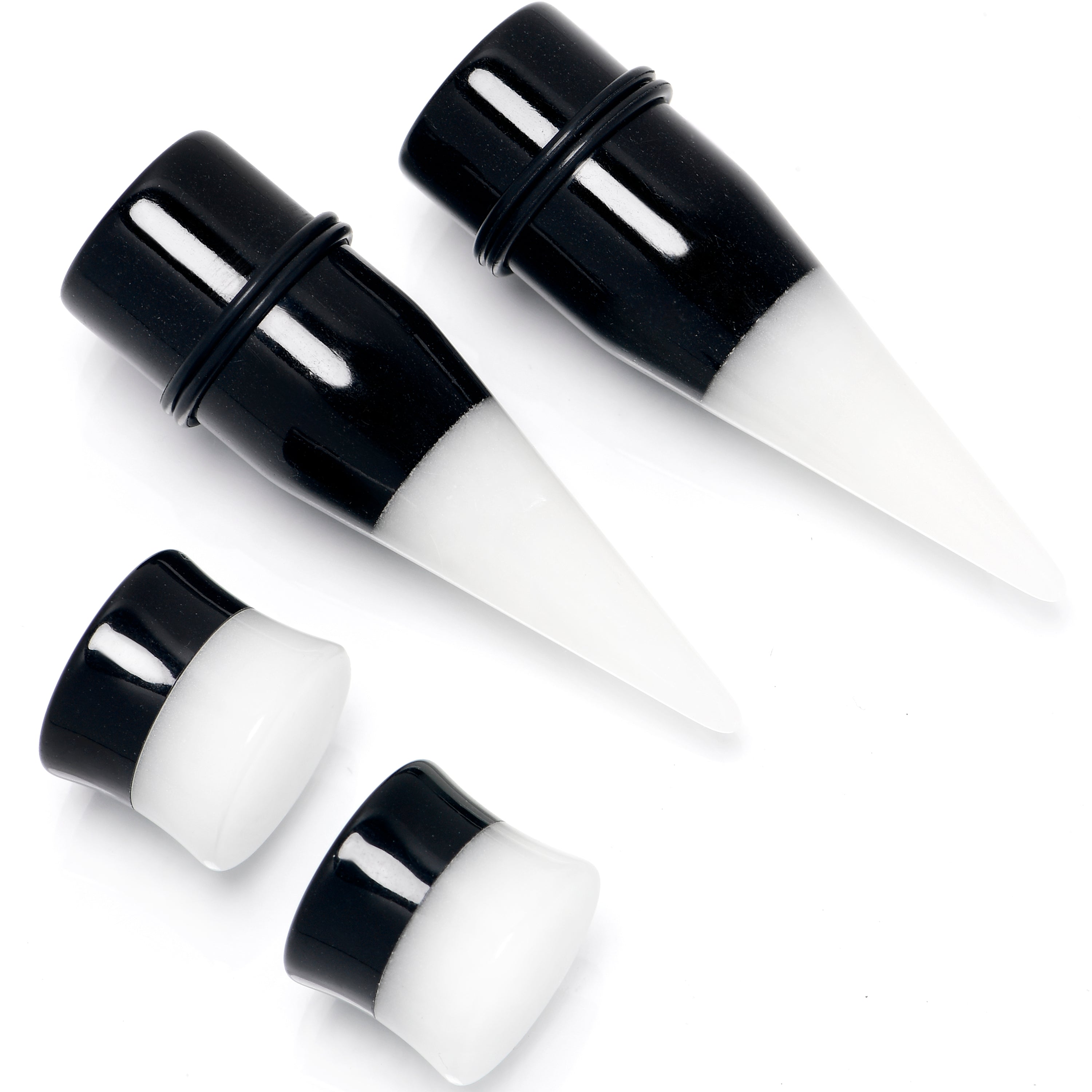 BodyCandy Black White Acrylic Glow in the Dark Taper Saddle Plug Set 8mm to 16mm Sizes — in-use photo