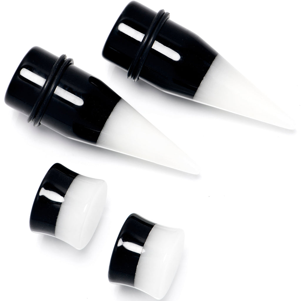 BodyCandy Black White Acrylic Glow in the Dark Taper Saddle Plug Set 8mm to 16mm Sizes — main product shot
