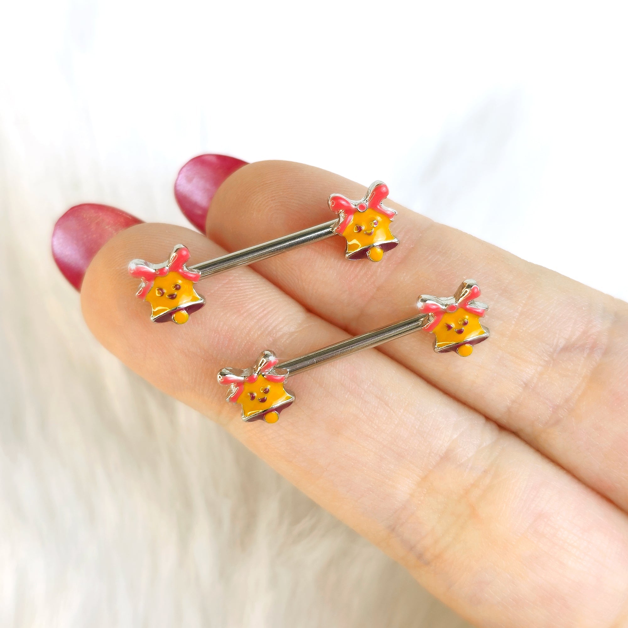 BodyCandy 14G 9/16 Holiday Bell Bling Barbell Nipple Ring Set — detail close-up
