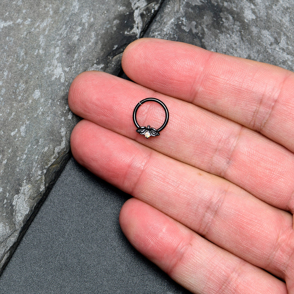BodyCandy 16G 3/8 Aurora Gem Black Beauty Bug Hinged Segment Ring — lifestyle context