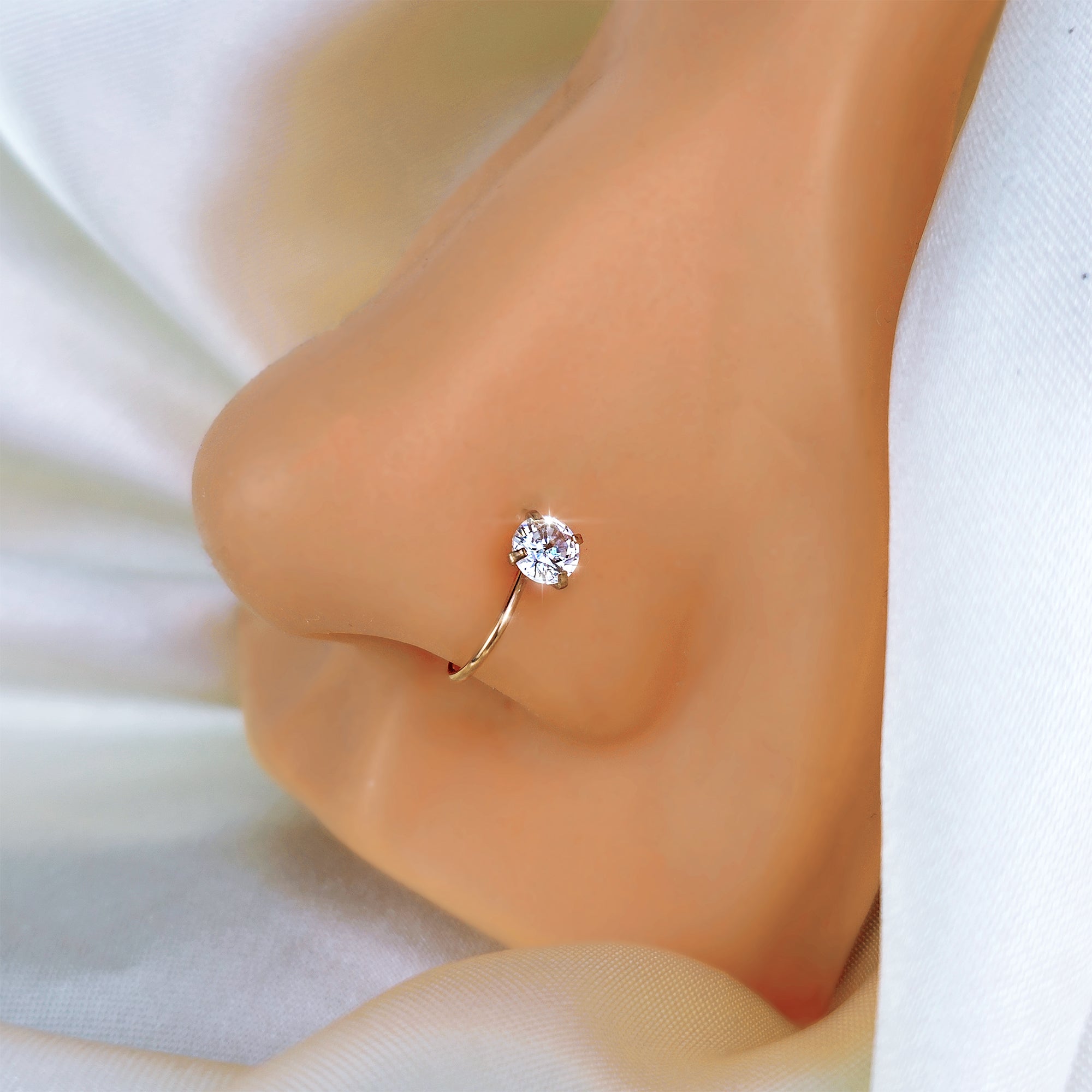 BodyCandy Rose Gold Stainless Steel CZ Clip on Fake Nose Ring — side view