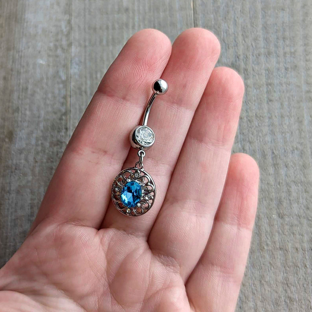 BodyCandy Clear Blue Gem Flower Oval Elegance Dangle Belly Ring — detail close-up