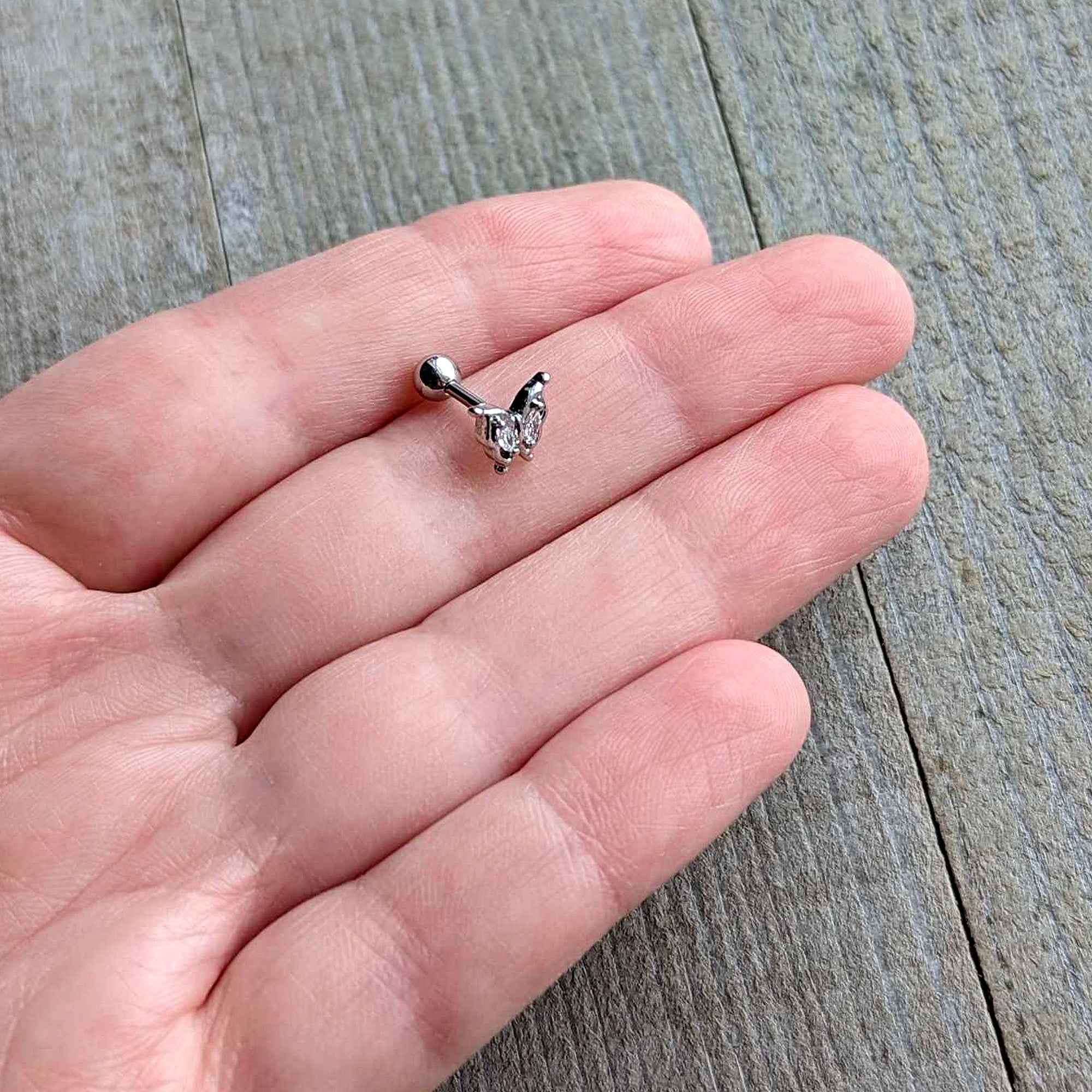 BodyCandy 16G 1/4 Clear Gem Fancy Fab Butterfly Cartilage Tragus Earring — side view